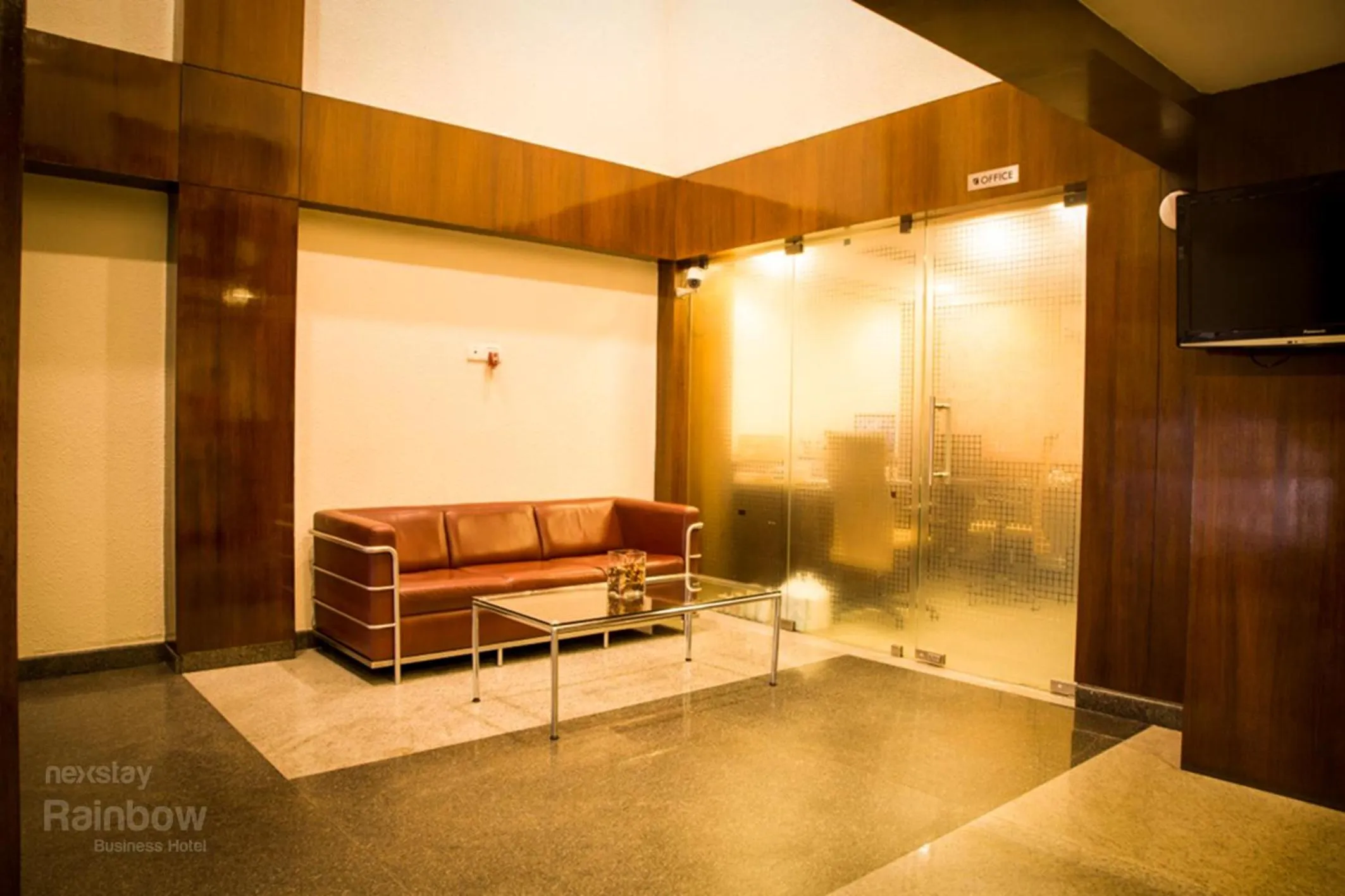 Seating area in New Rainbow Business Hotel