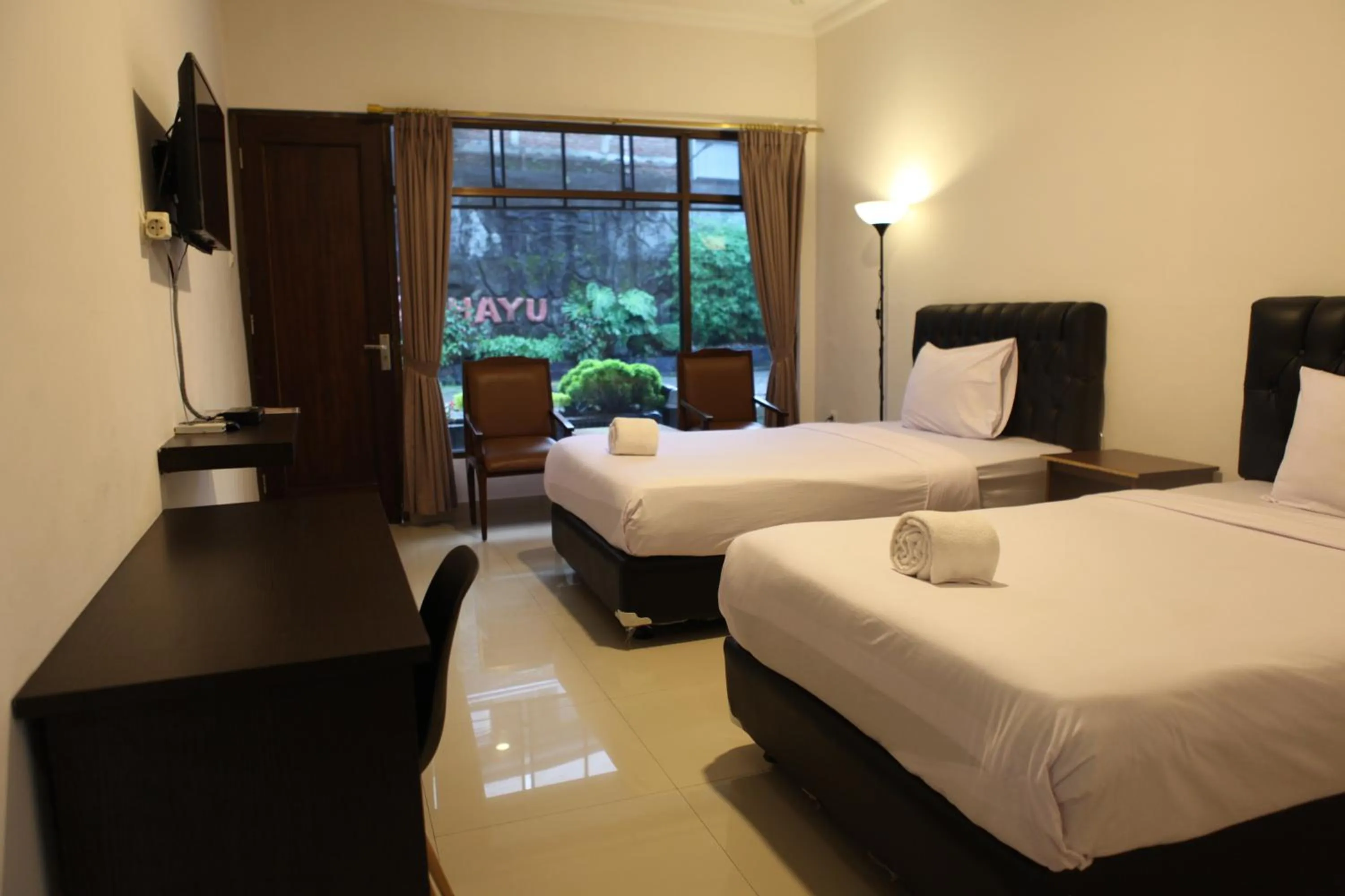 Bed in Rahayu Hotel Cirebon