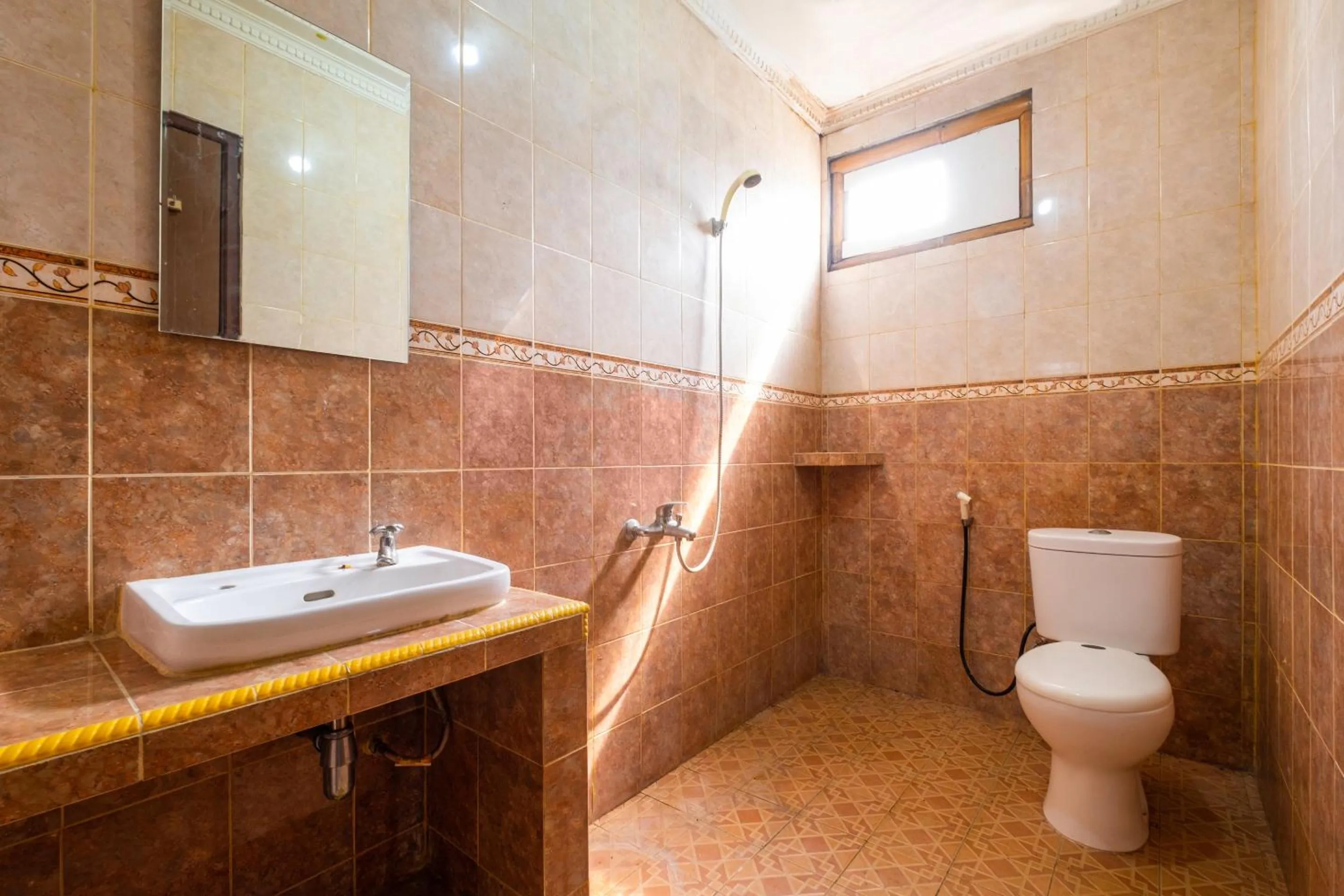 Bathroom in OYO 2278 Cikidang Hunting Resort