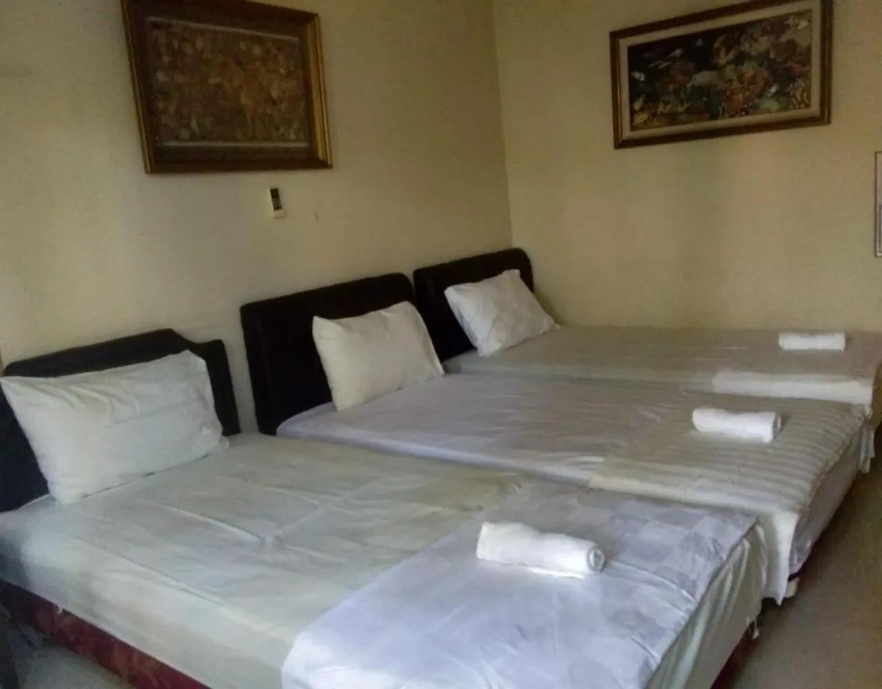 Bed in Mettaloka Guesthouse