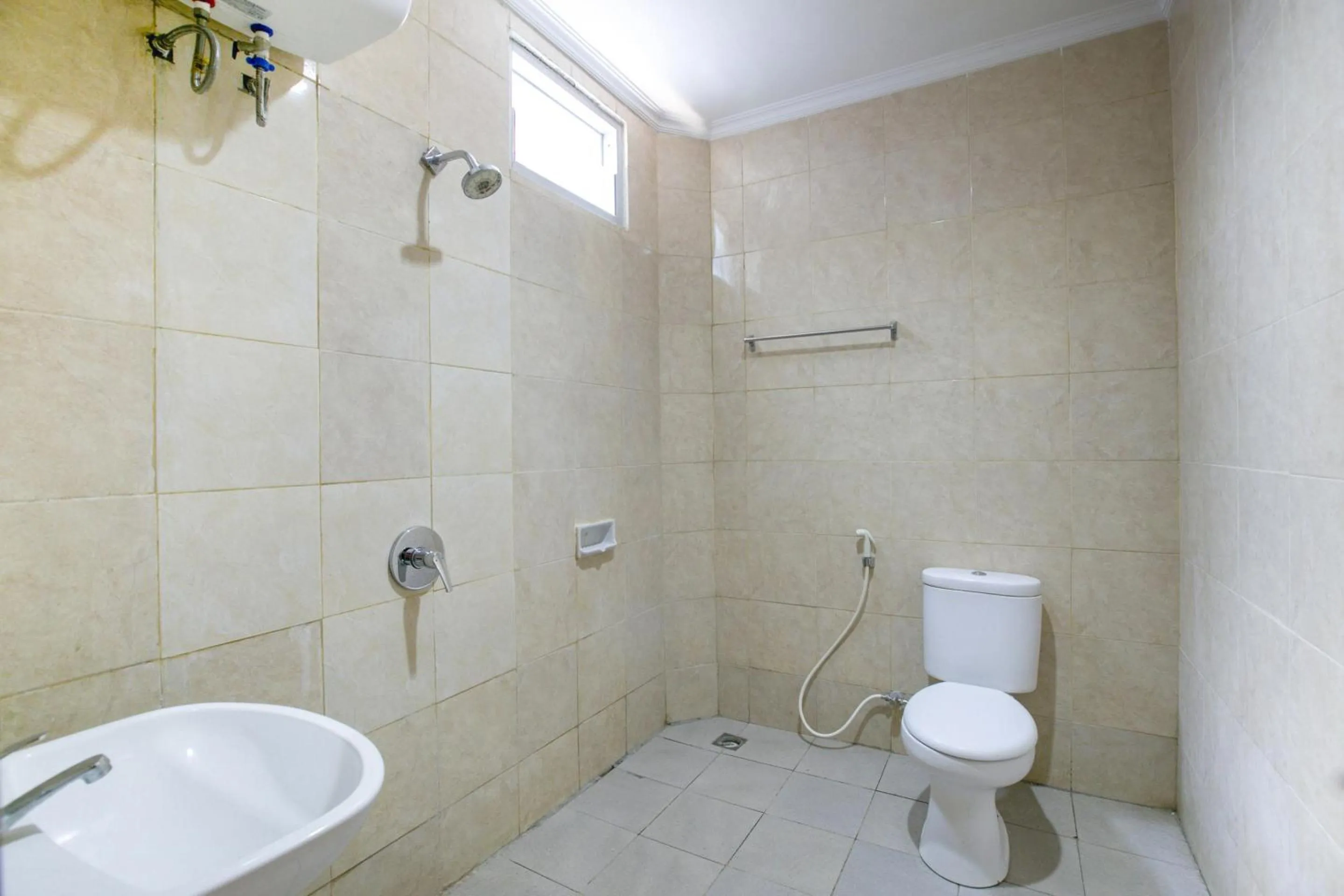 Bathroom in Hotel O Charvita