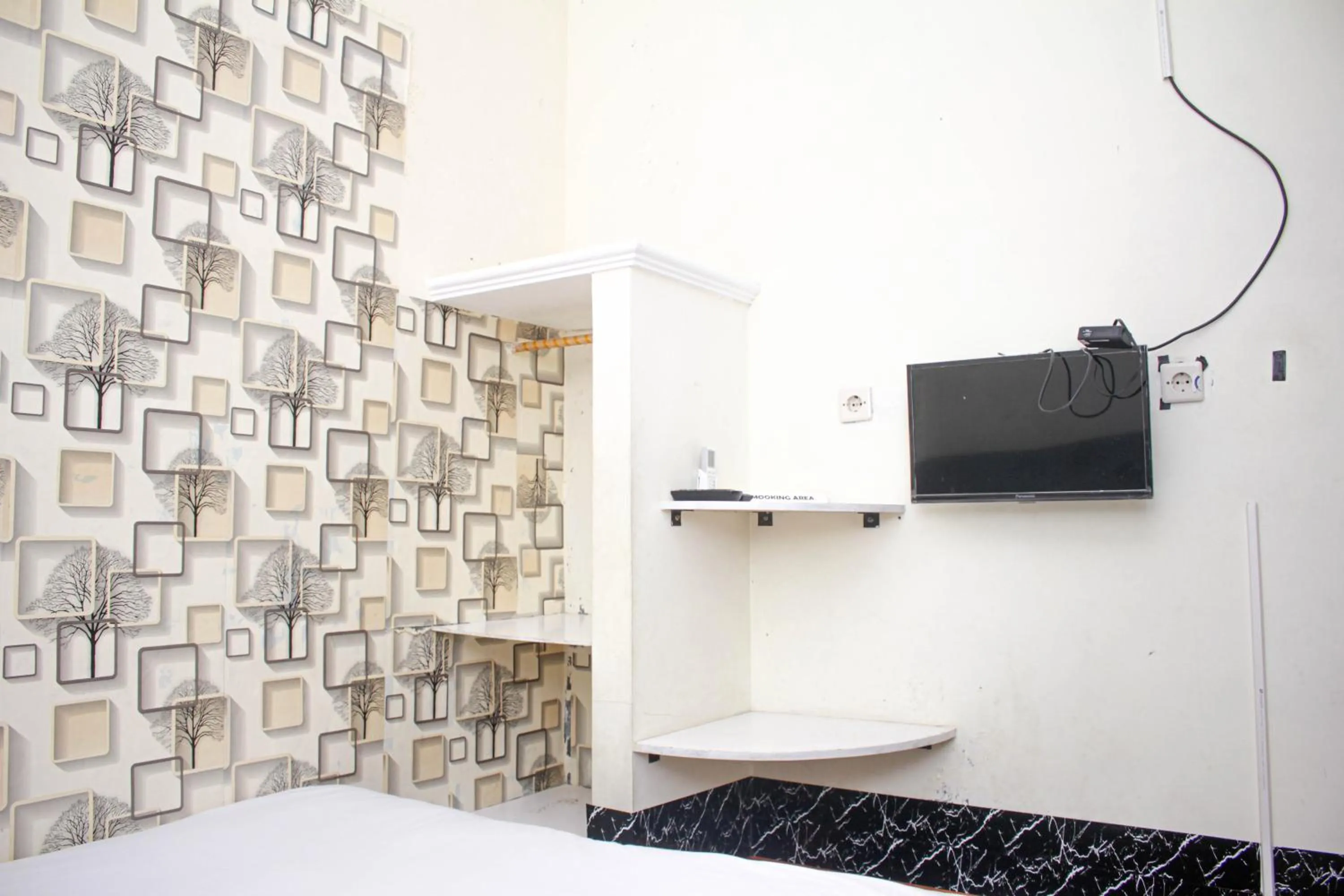 Bedroom, Bed in Capital O 2258 Santana Syariah Guest House