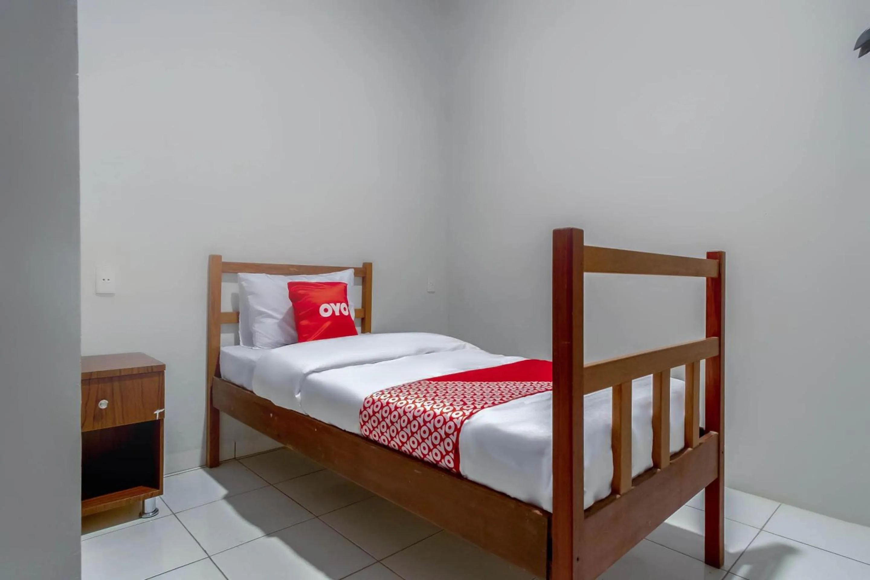 Bedroom, Bed in Hotel O HOMESTAY JAYA