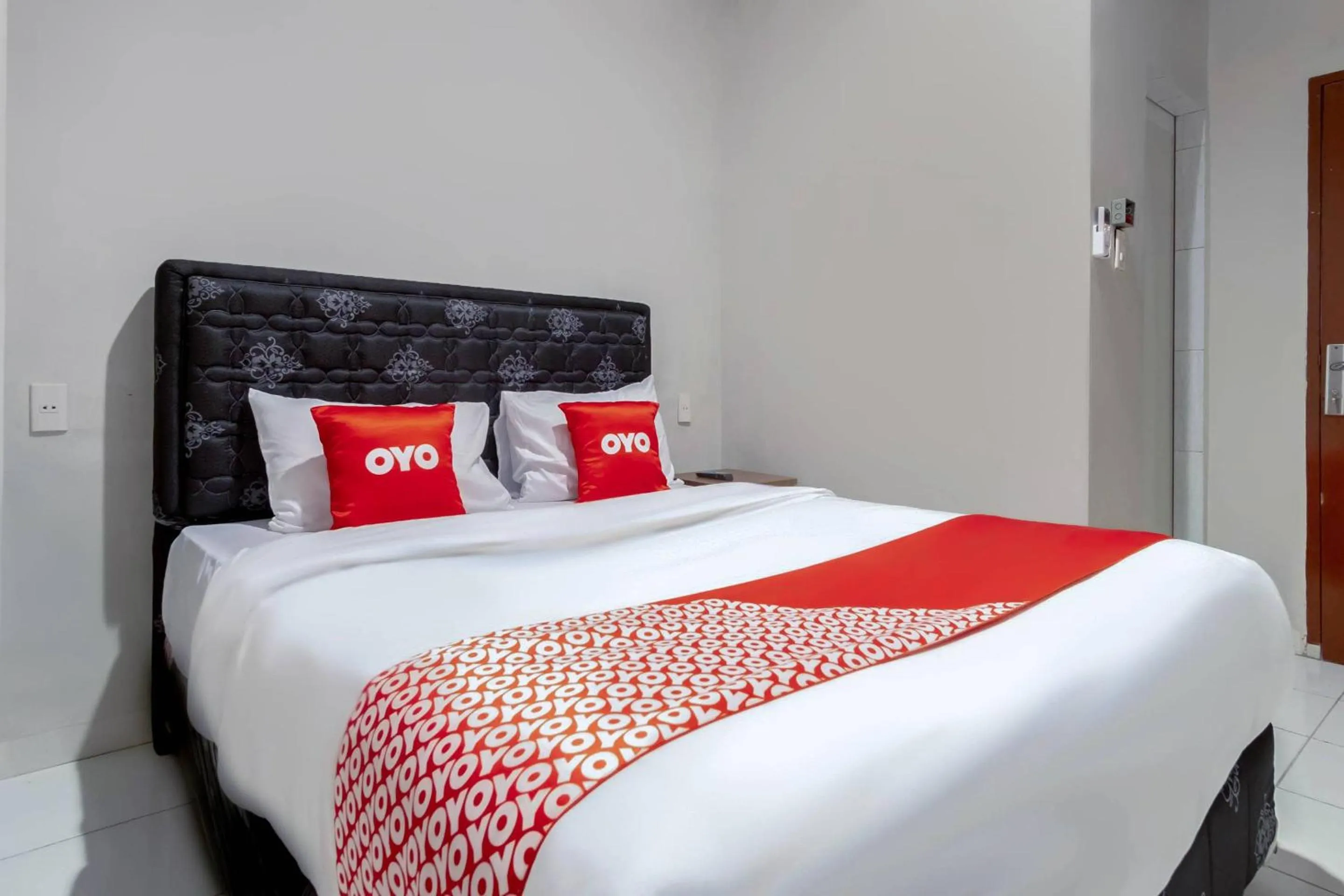 Bedroom, Bed in Hotel O HOMESTAY JAYA