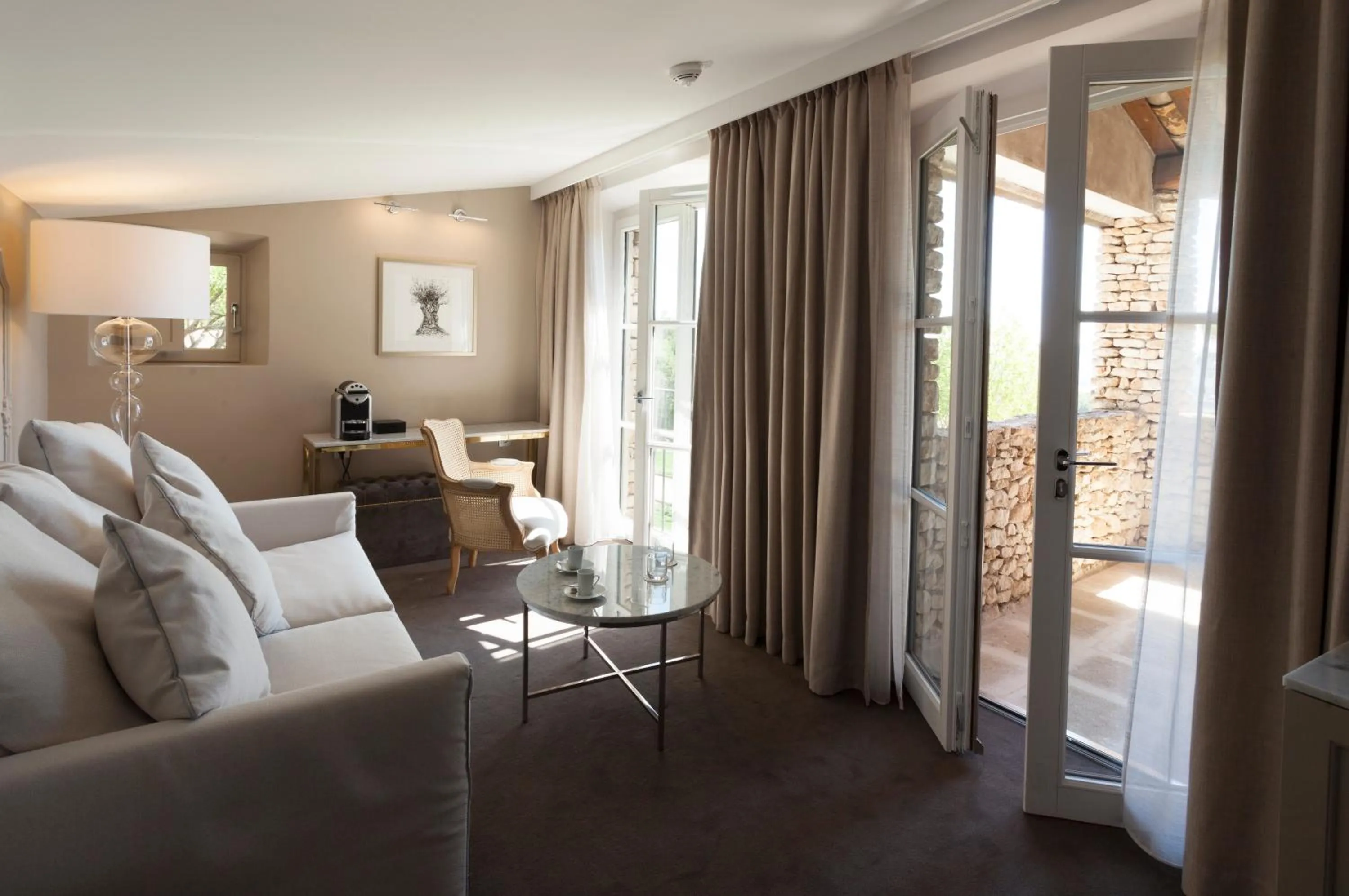 Living room in Mas des Herbes Blanches Hôtel & Spa – Relais & Châteaux