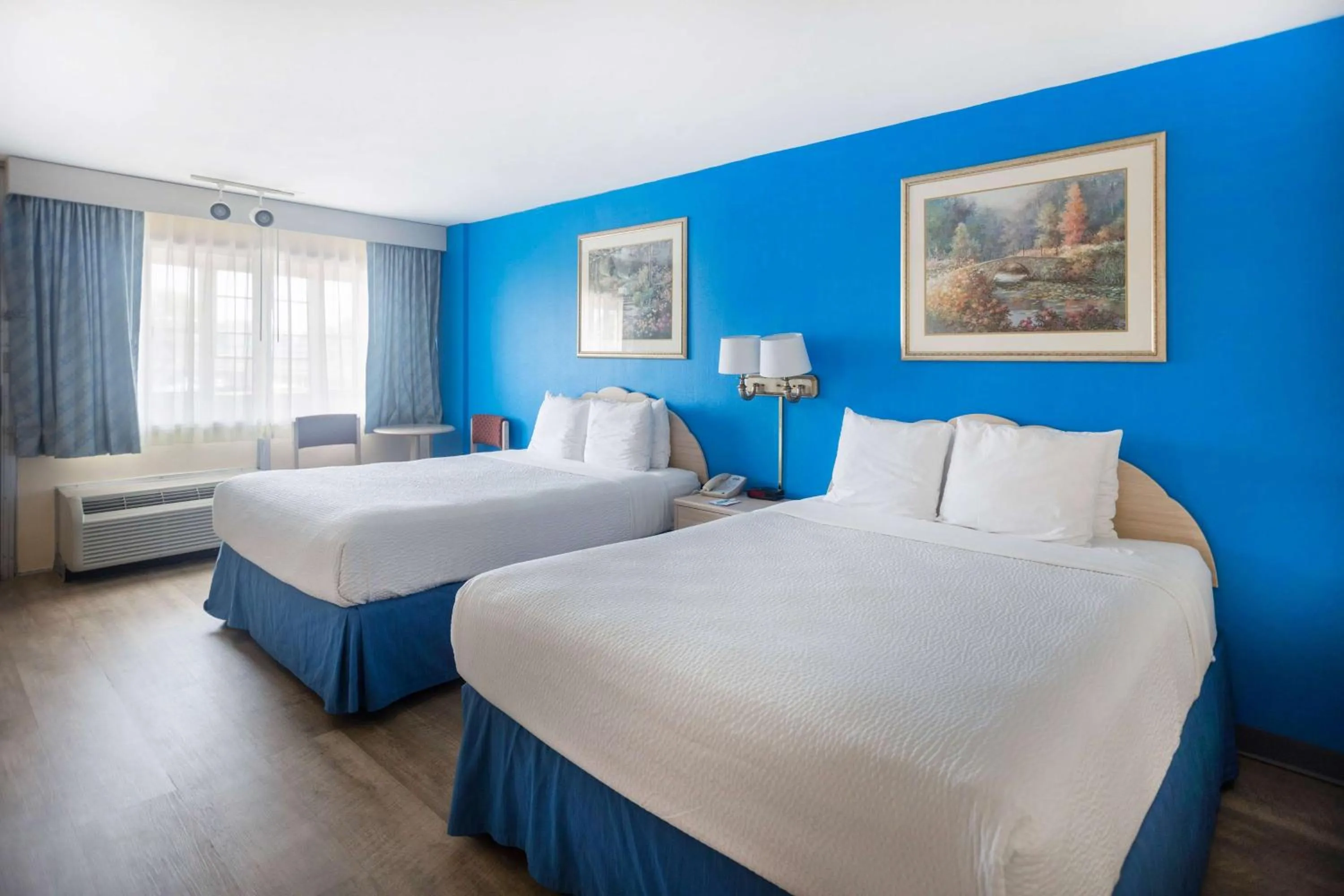 Photo of the whole room in Days Inn by Wyndham Hicksville Long Island