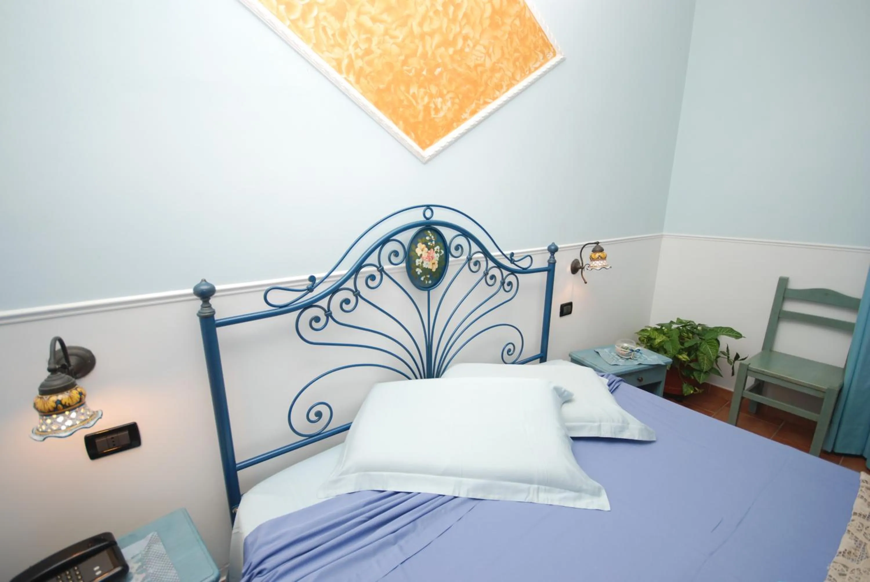 Bed in Hotel Oasi da Paolo