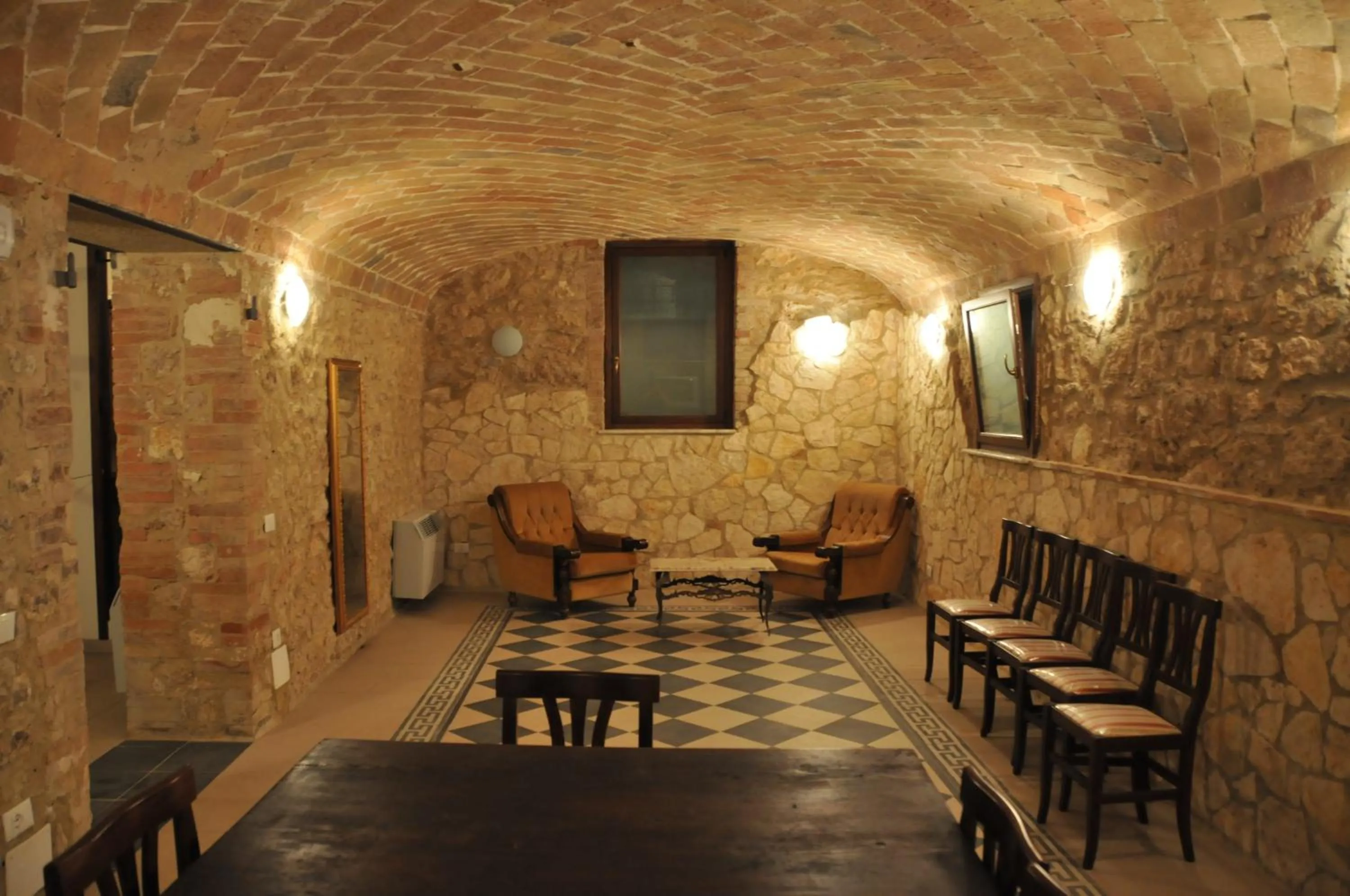 Communal lounge/ TV room in Villa Regina