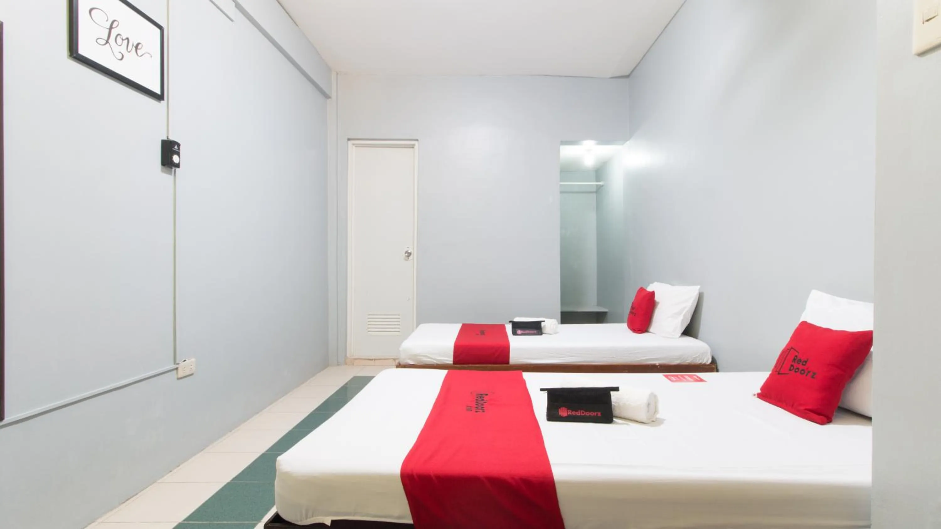 Bed in RedDoorz at Teofila Lodge