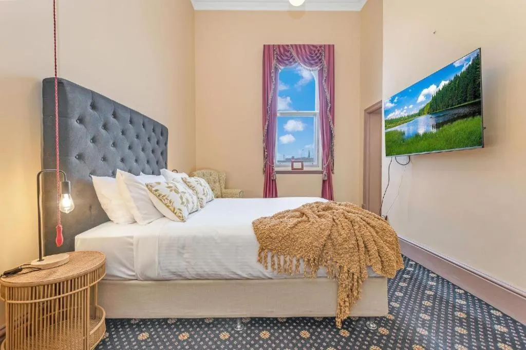 Bed in Clocktower Suites