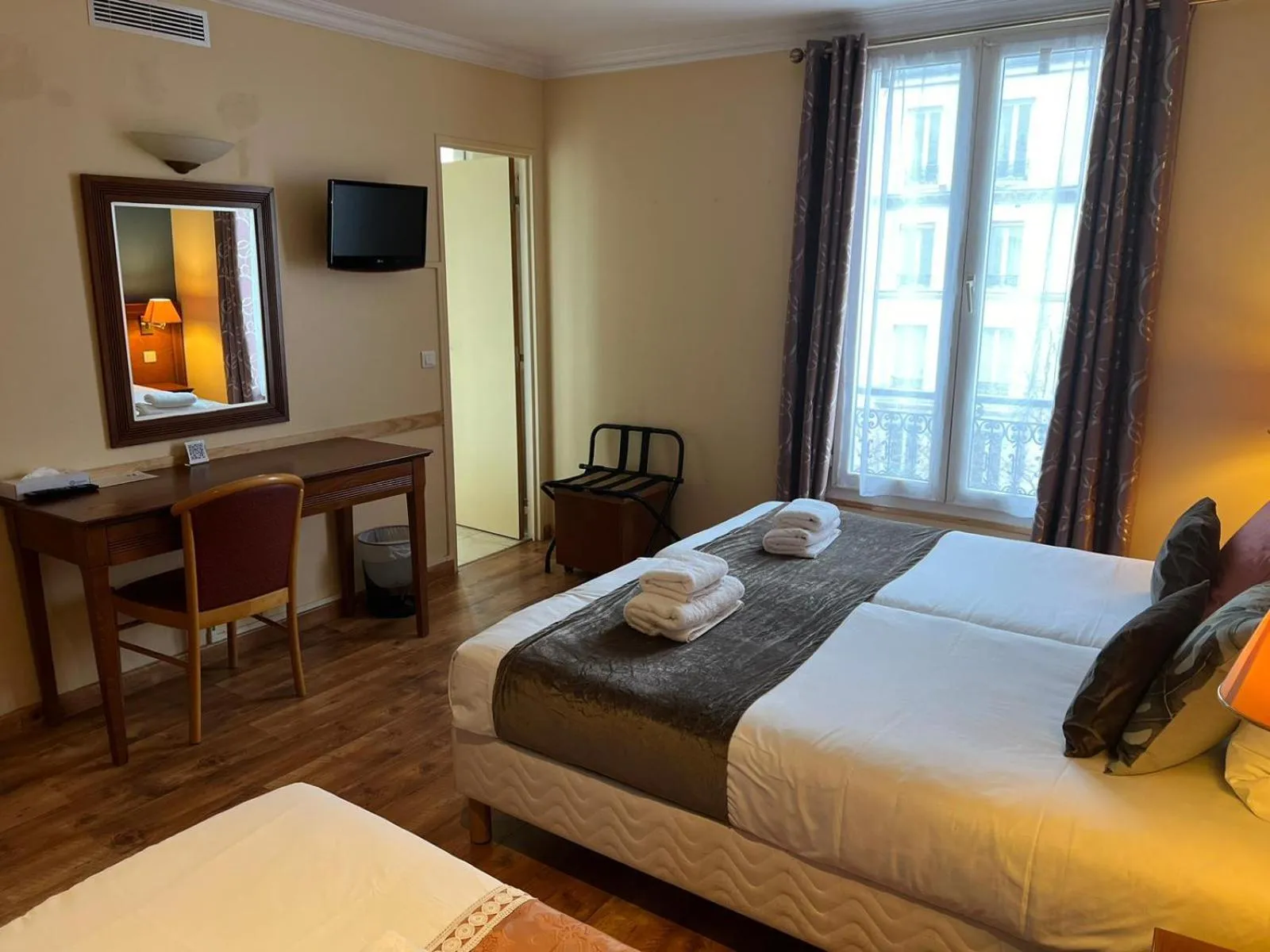 Bed in 121 Paris Hotel