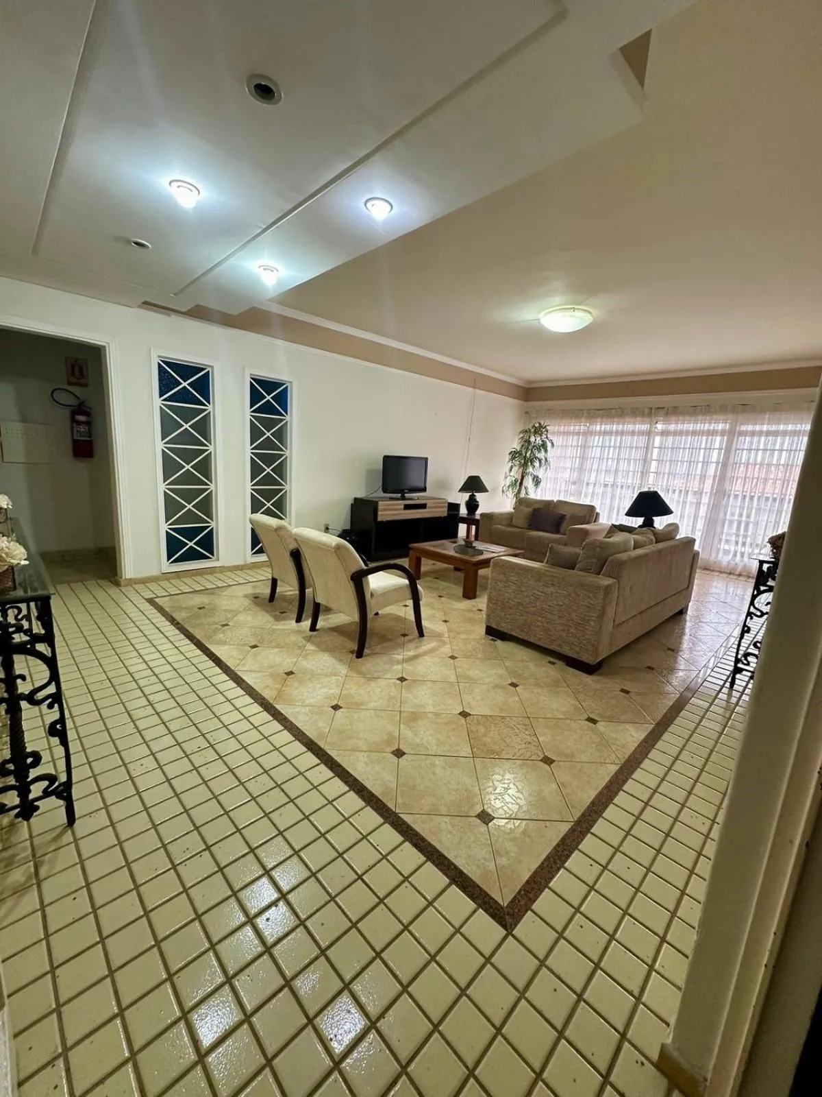 Communal lounge/ TV room in Palace Hotel