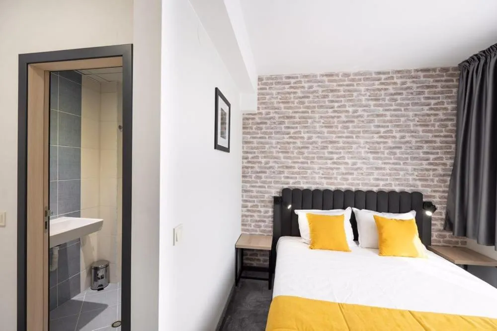 Bed in ADEO HOTEL Sport & SPA