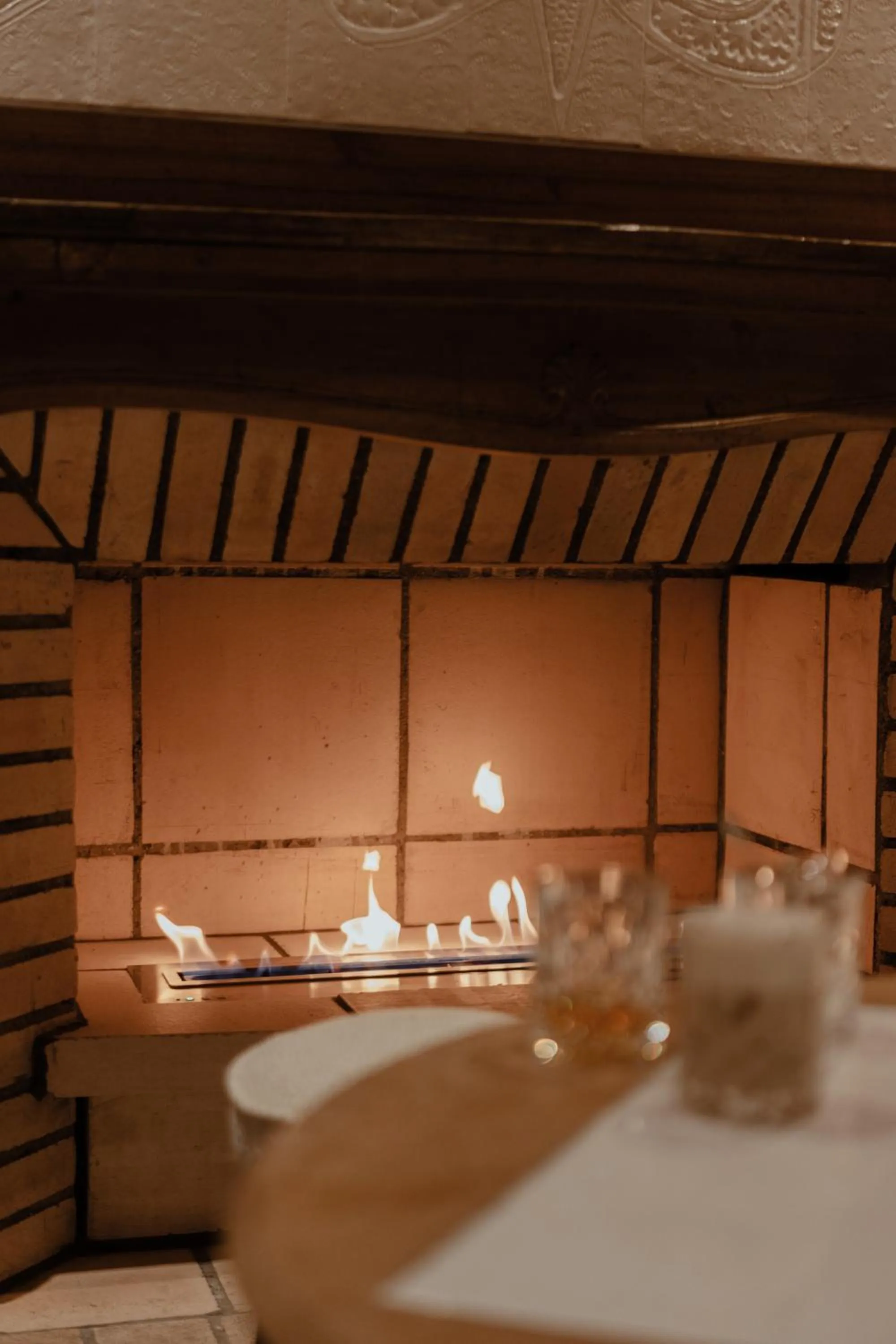 fireplace, Bed in Hotel Mont Blanc Megève