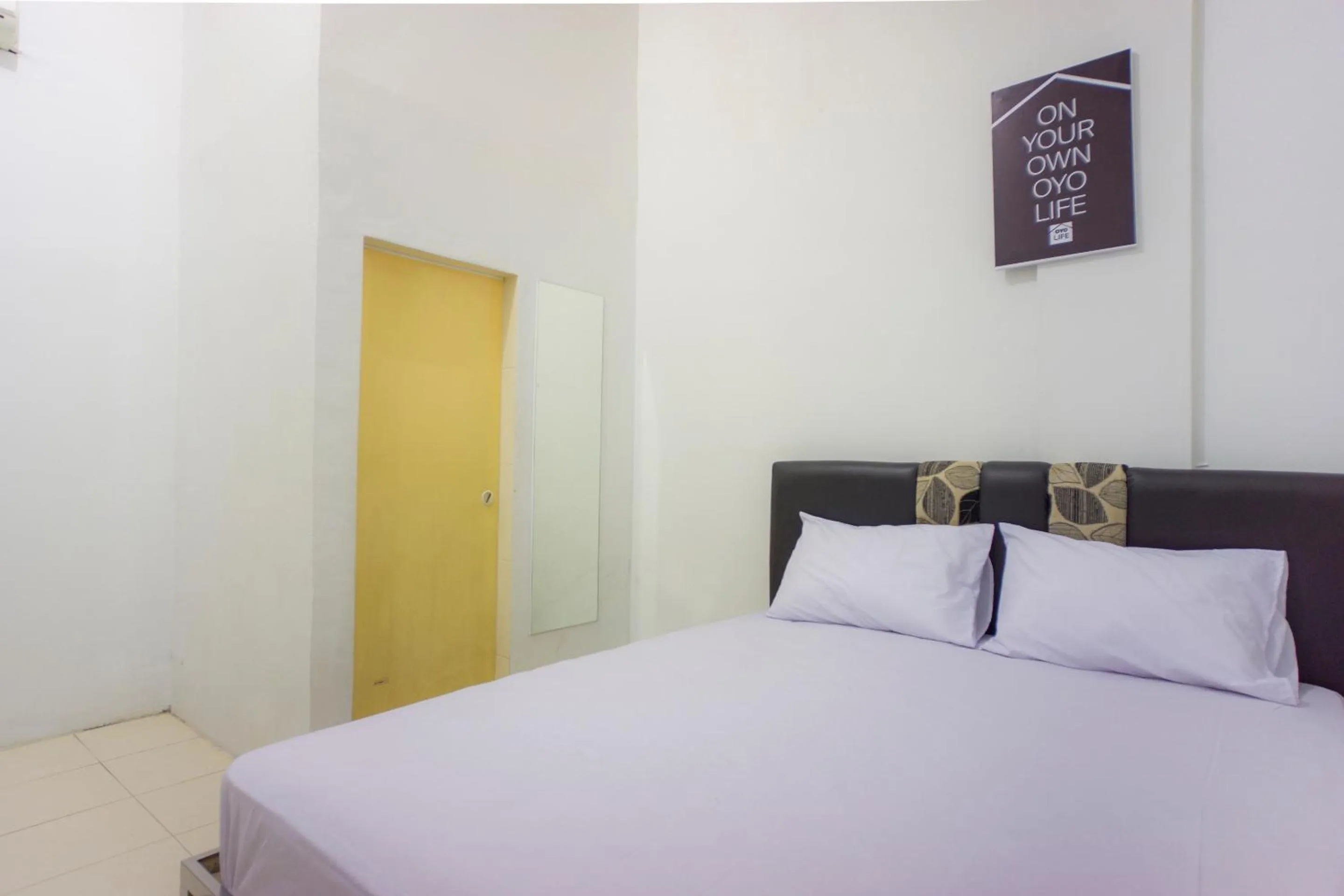 Bedroom, Bed in OYO Life 2366 Gatsu Kost