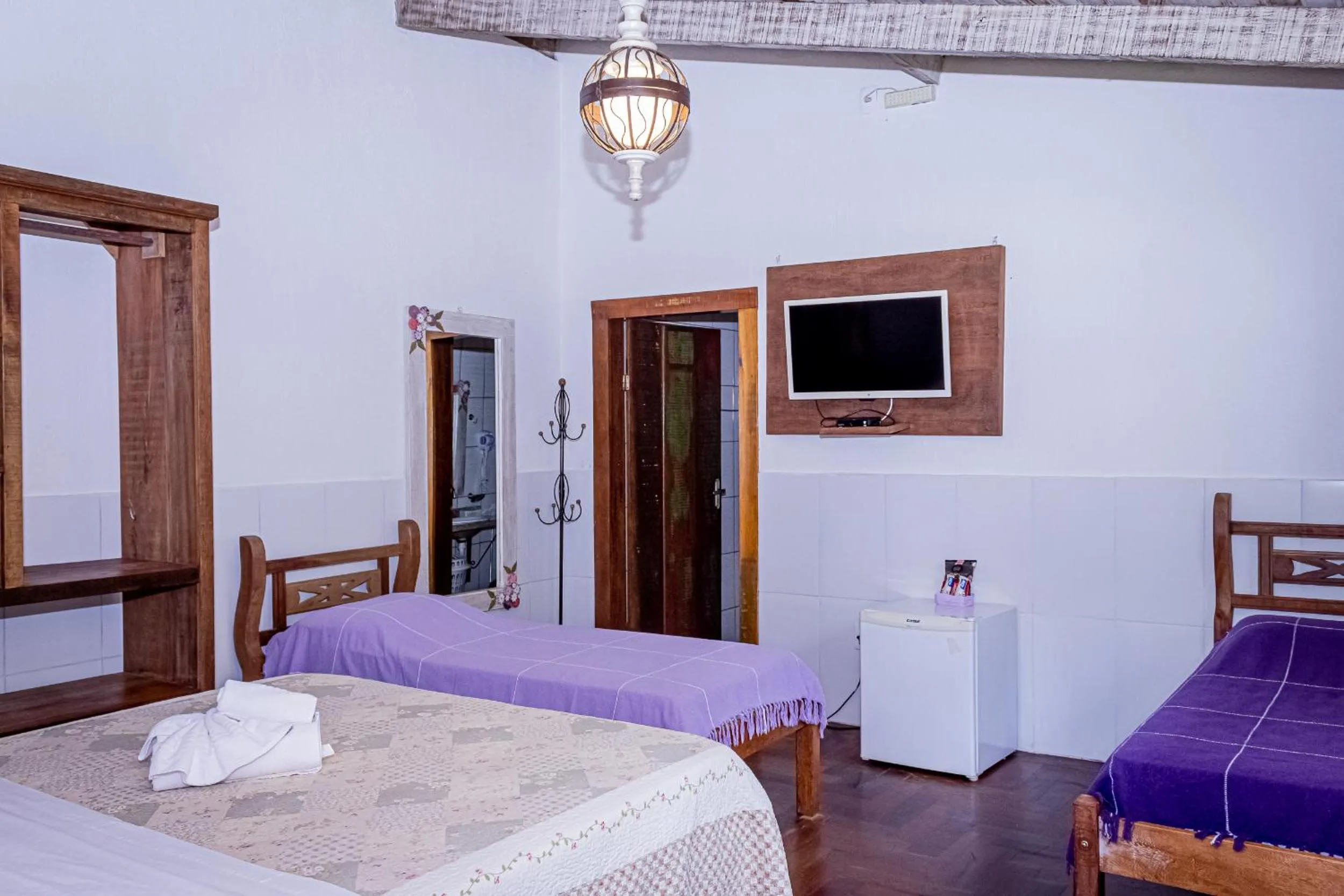 Bed in Casa de Violeta Pousada