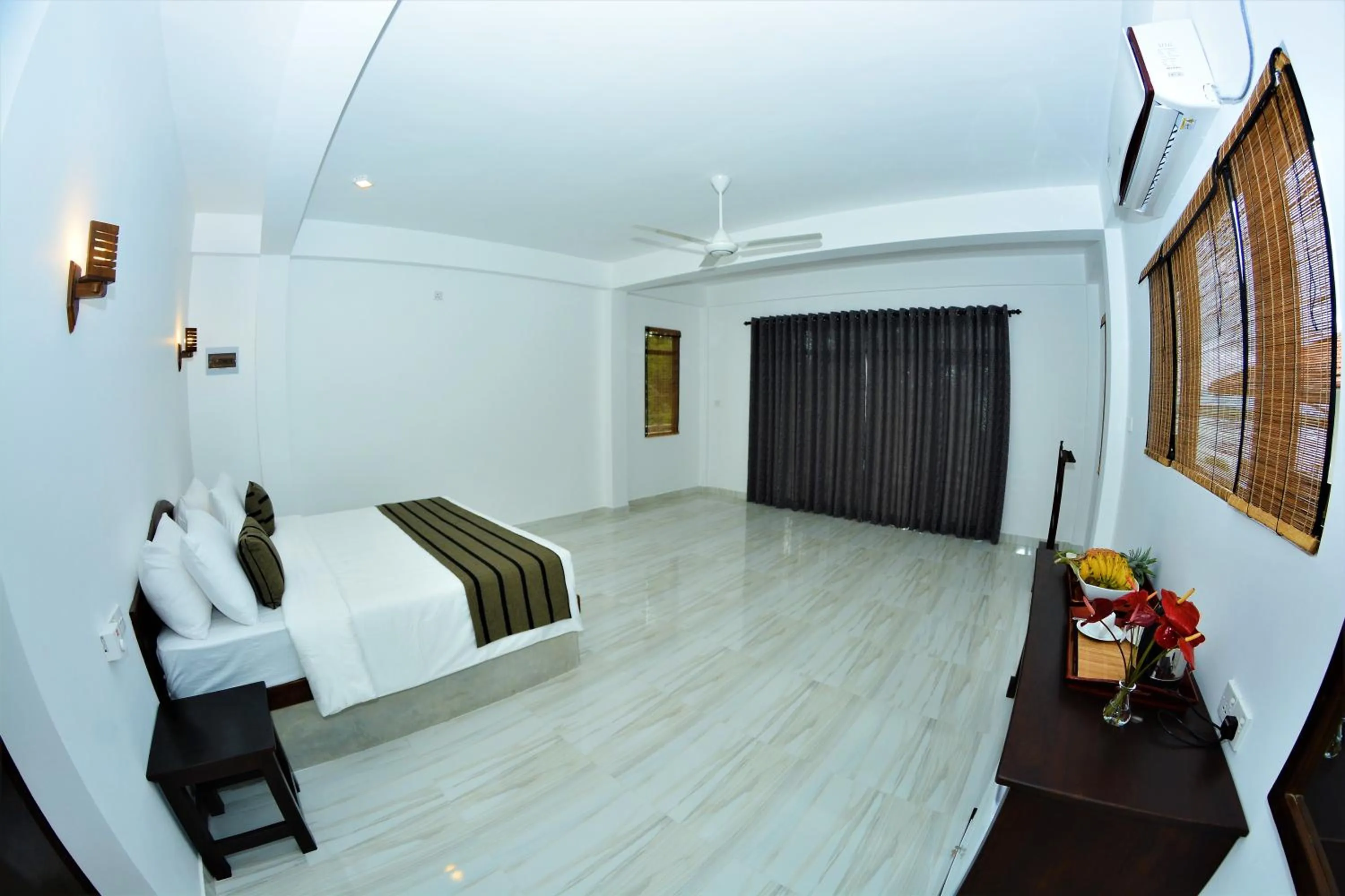 Photo of the whole room, Bed in Ashansa Lagoon Resort