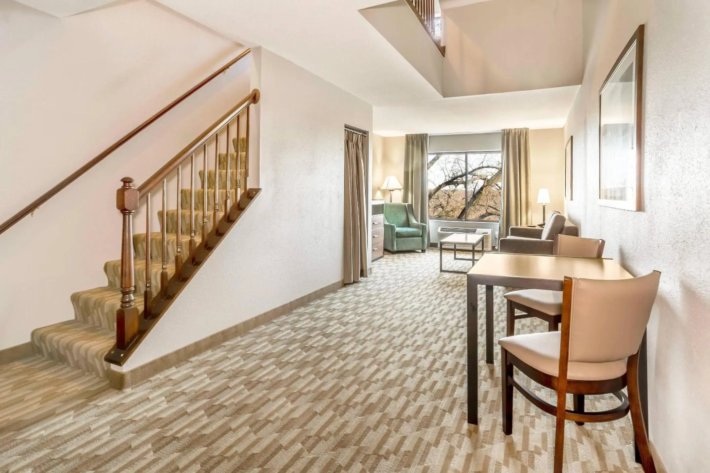 King Suite with Sofa Bed in Riverview Inn & Suites, an Ascend Collection Hotel King Suite with Sofa Bed in Riverview Inn & Suites, an Ascend Collection Hotel