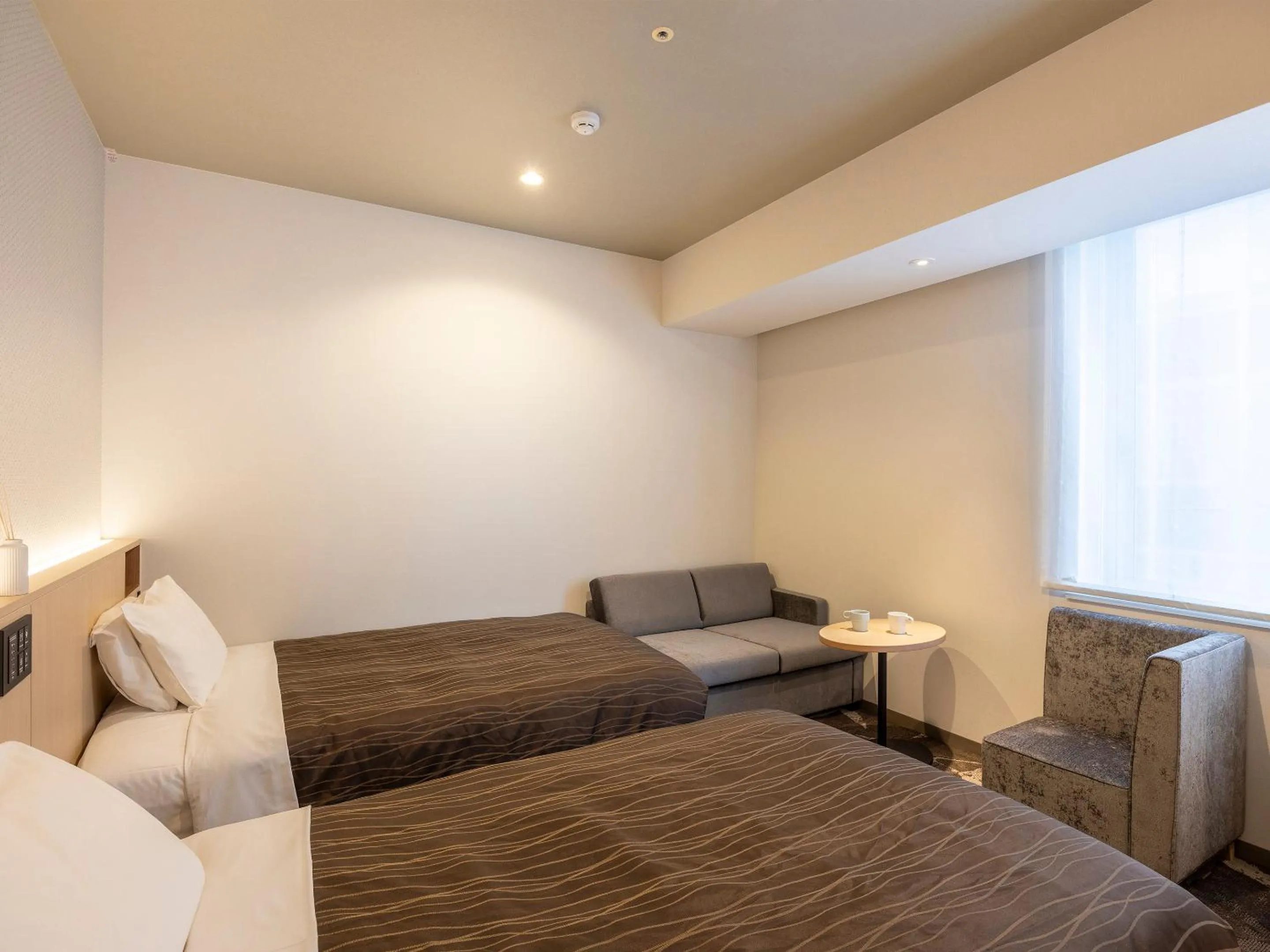 Bed in Sendai Washington Hotel