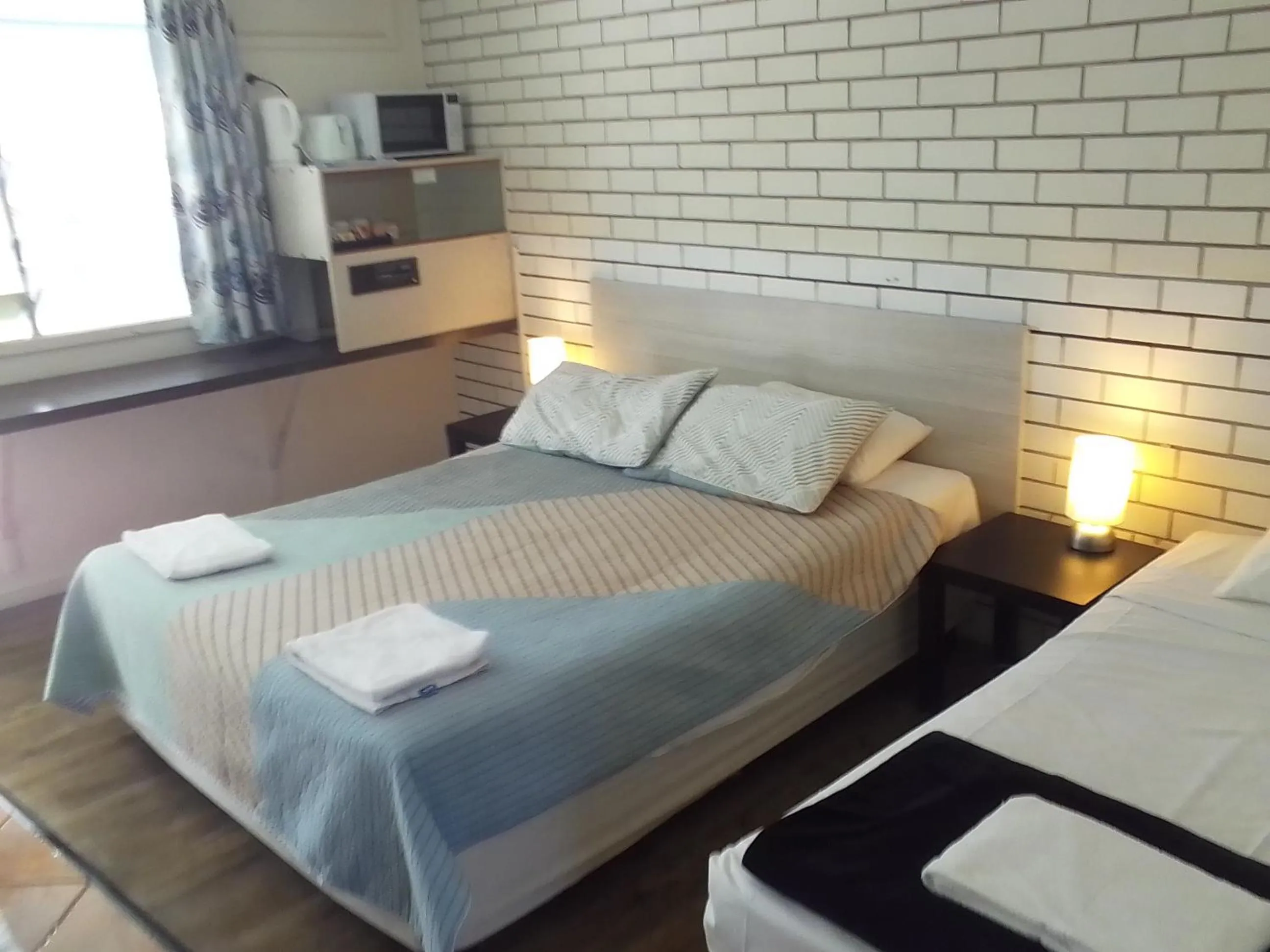 Bed in Paradise Motel