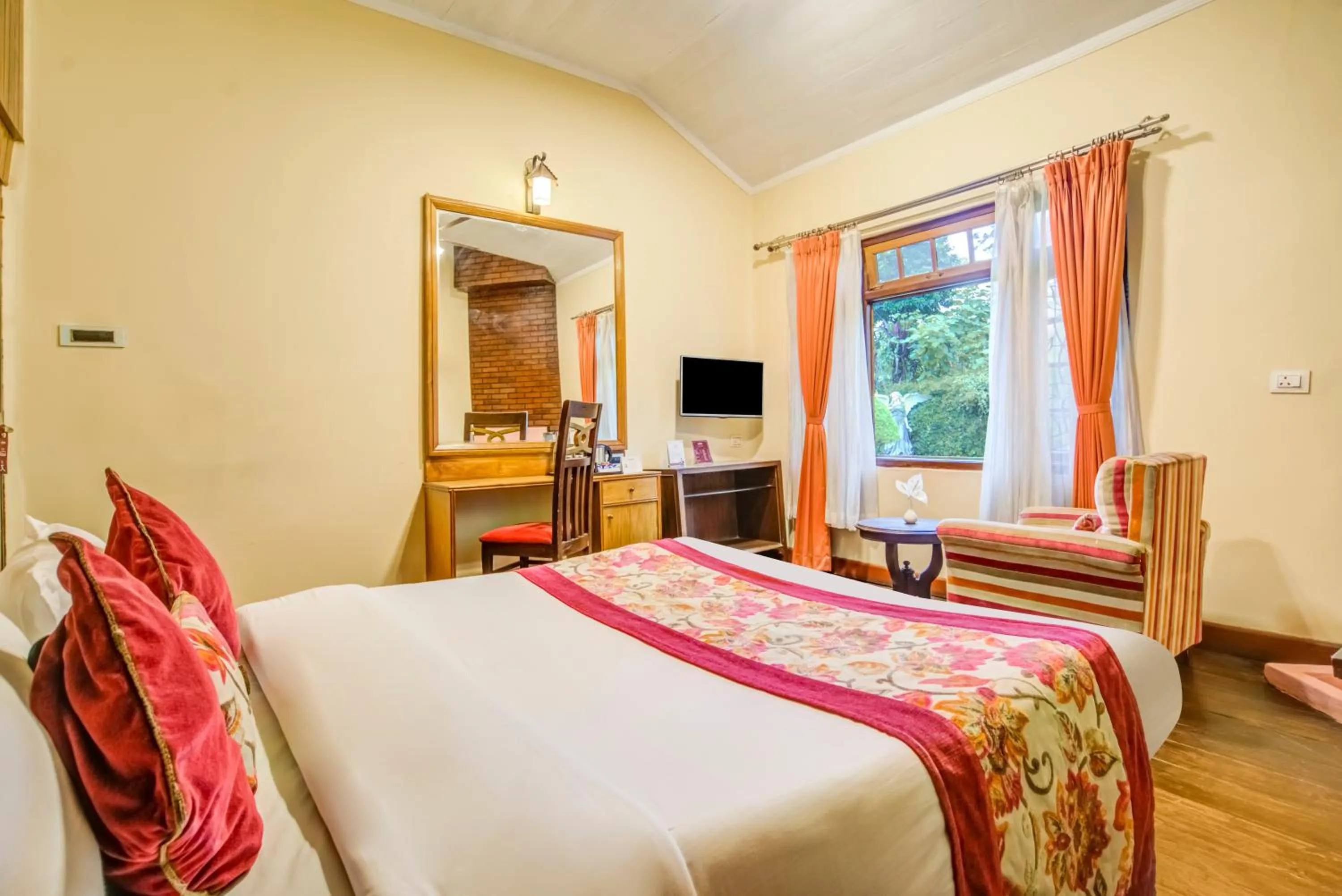 Bed in Summit Barsana Resort & Spa