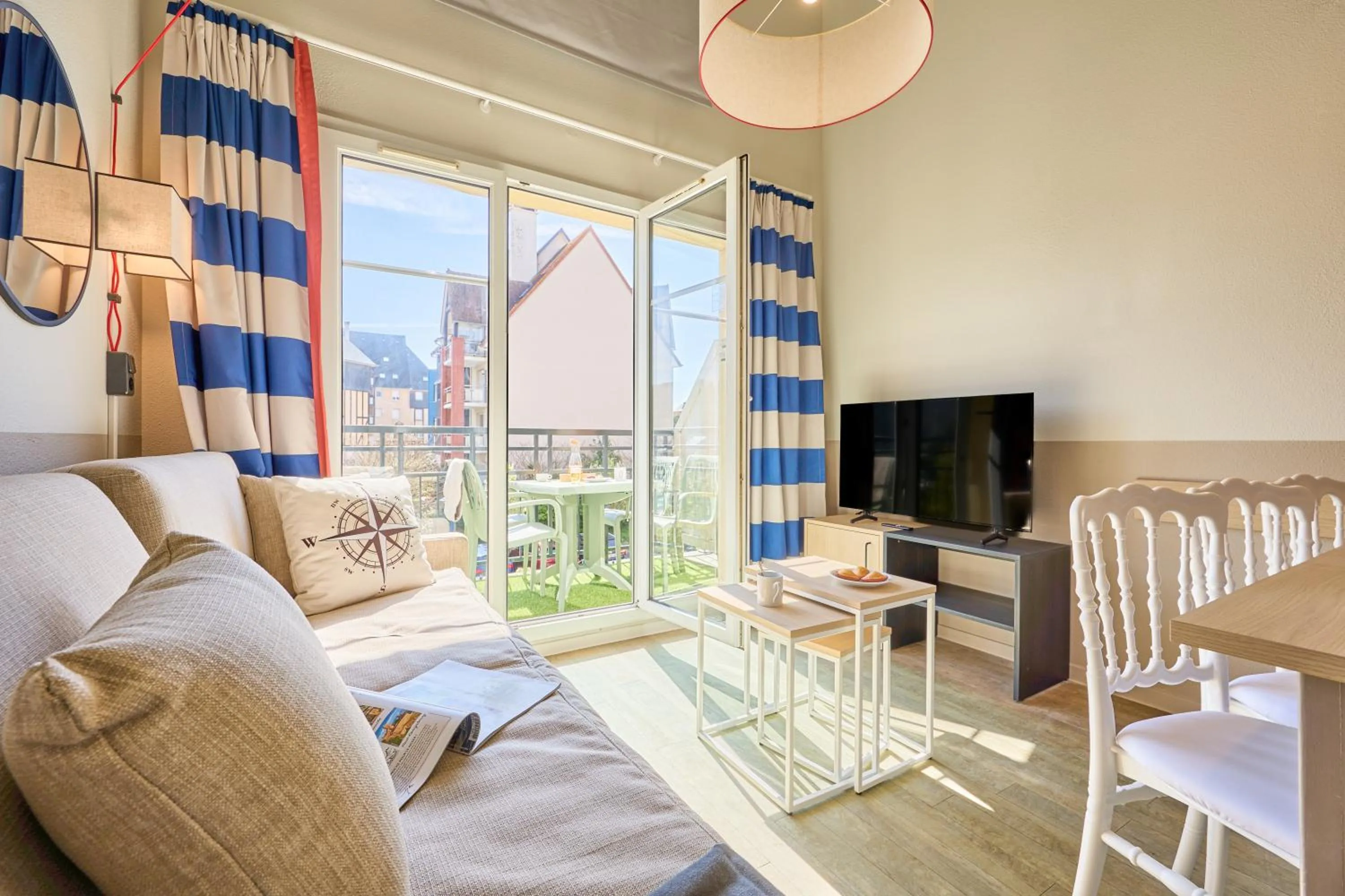 Communal lounge/ TV room in Residence Pierre & Vacances Port Guillaume