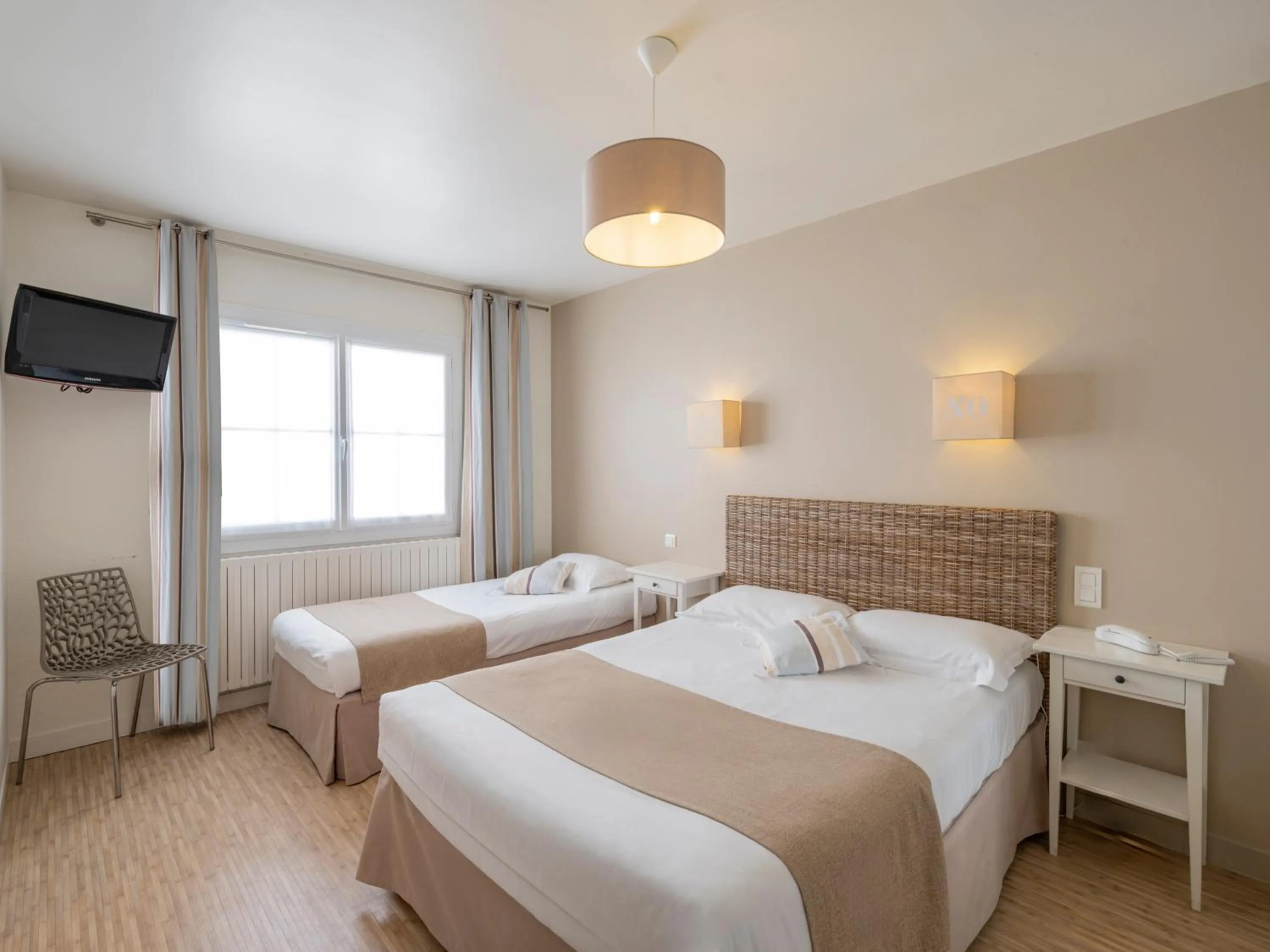 Bed in Hotel Autre Mer