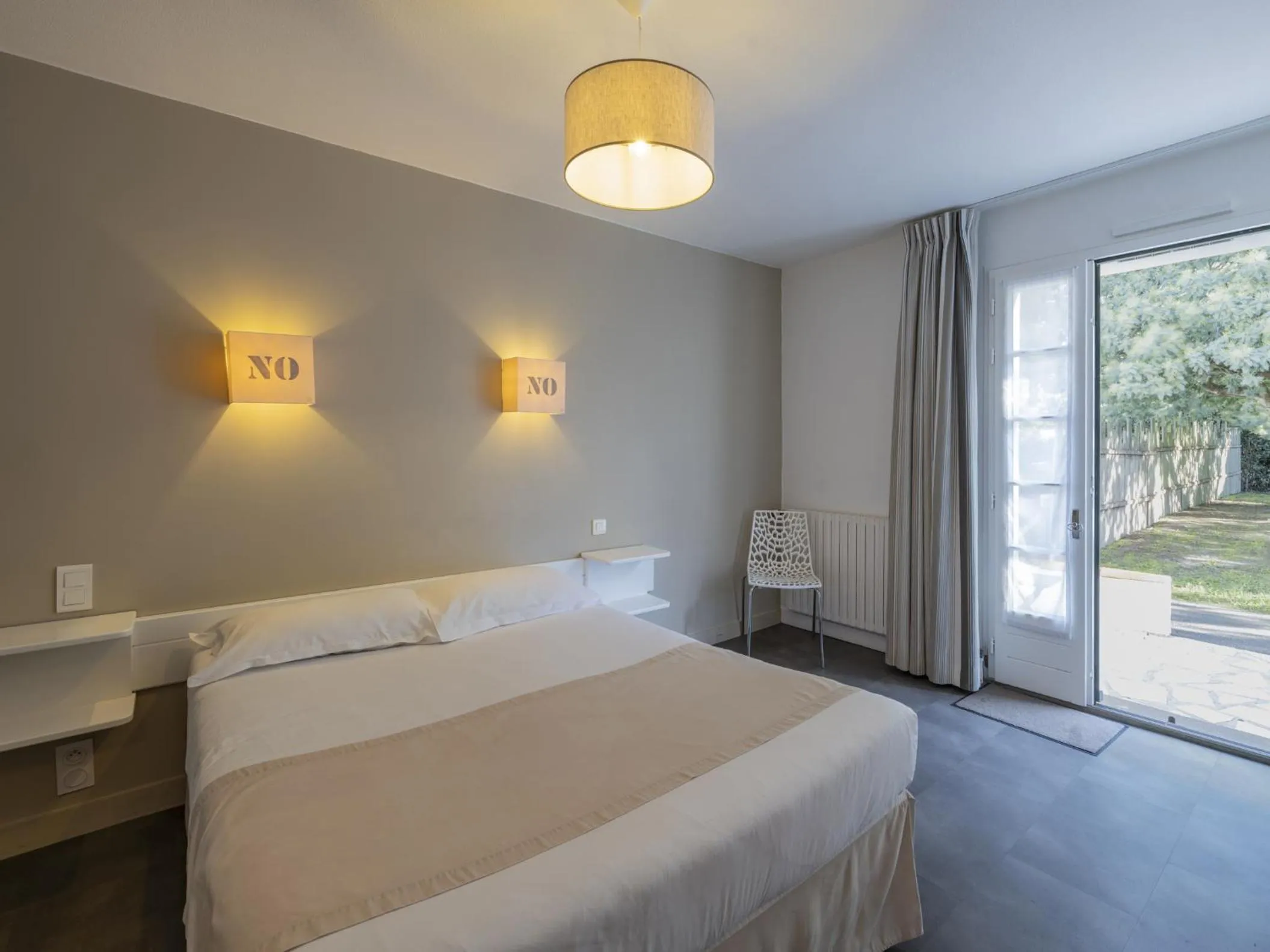 Bed in Hotel Autre Mer