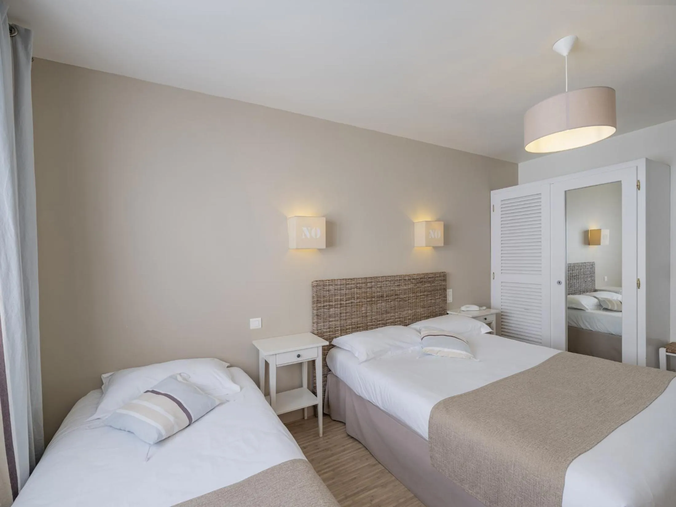 Bed in Hotel Autre Mer