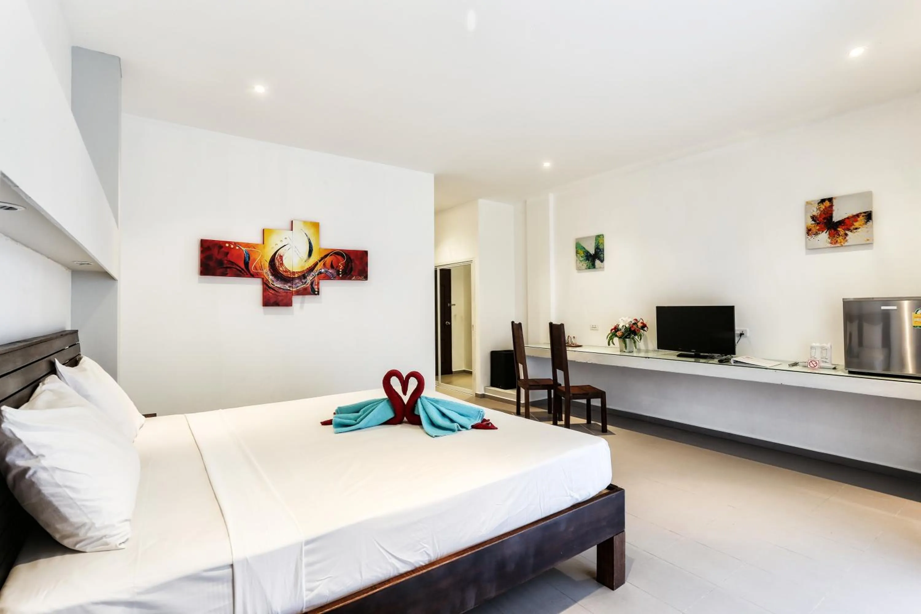 Photo of the whole room, Bed in Austrian Garden Hotel & Restaurant Patong