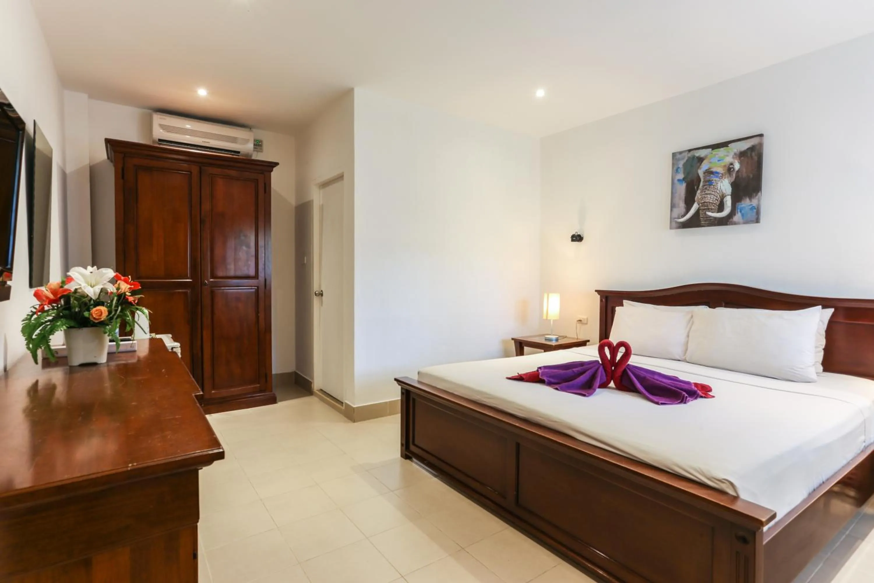 Photo of the whole room, Bed in Austrian Garden Hotel & Restaurant Patong