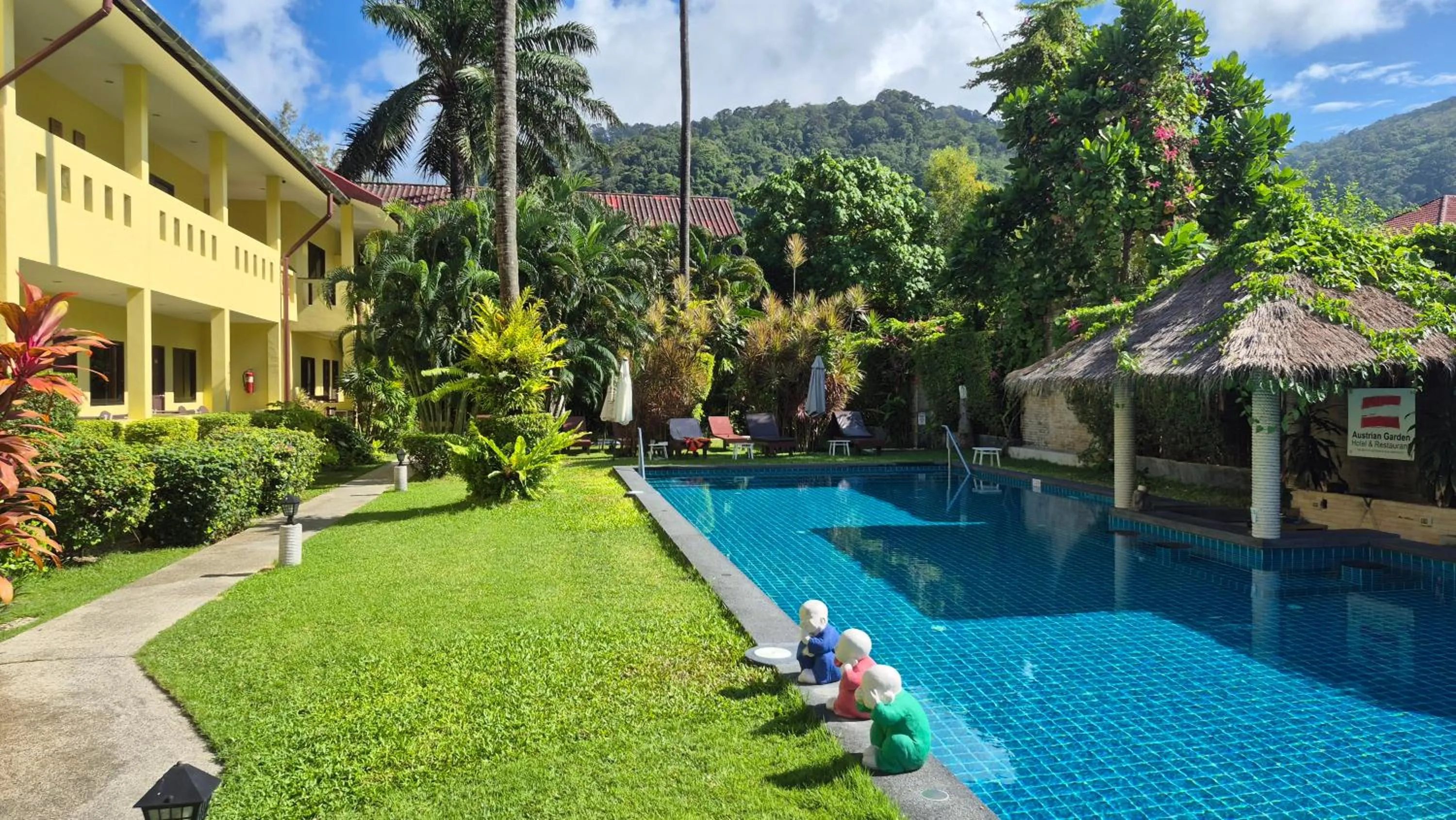 Swimming pool in Austrian Garden Hotel & Restaurant Patong