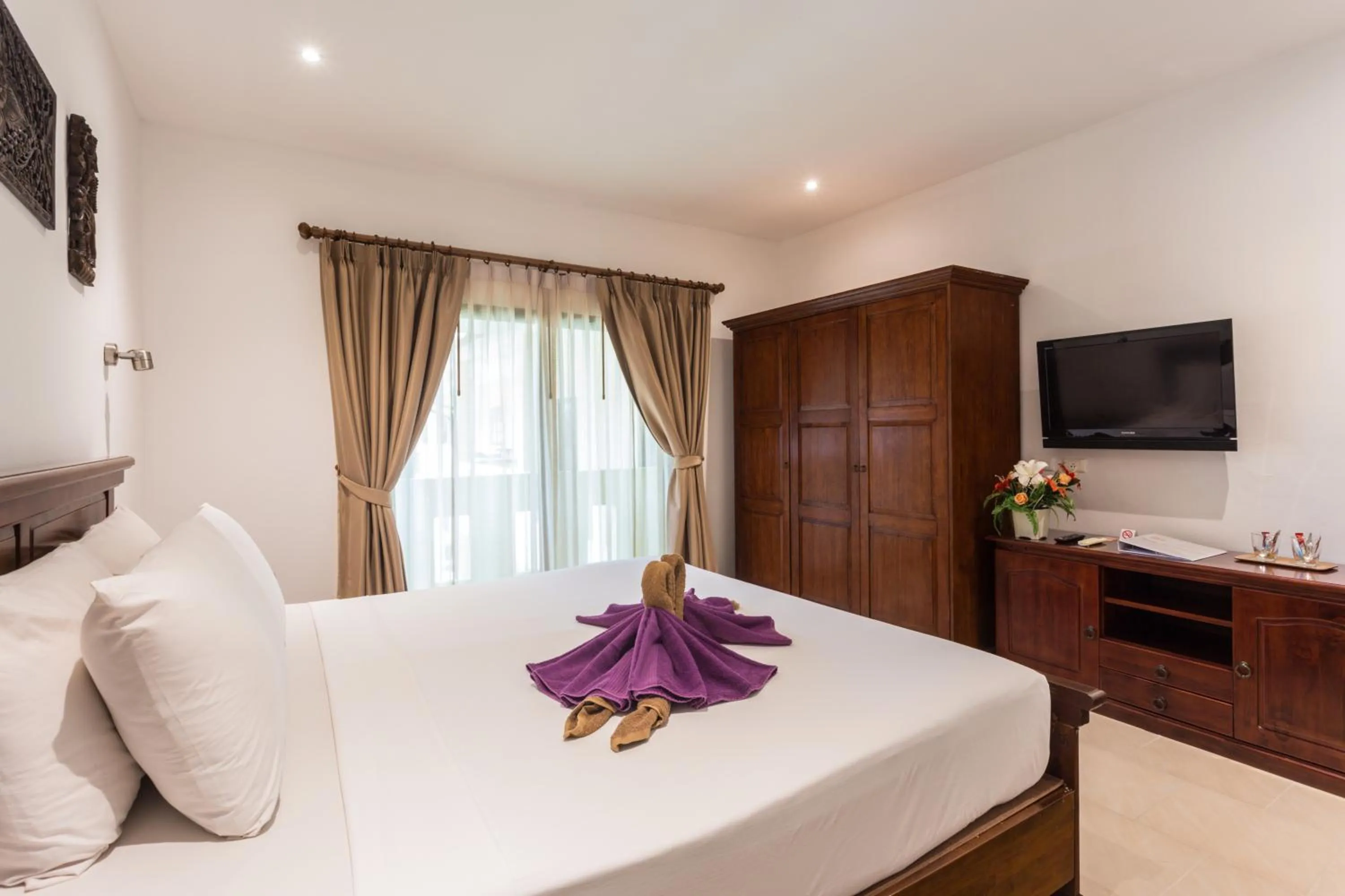 Photo of the whole room, Bed in Austrian Garden Hotel & Restaurant Patong