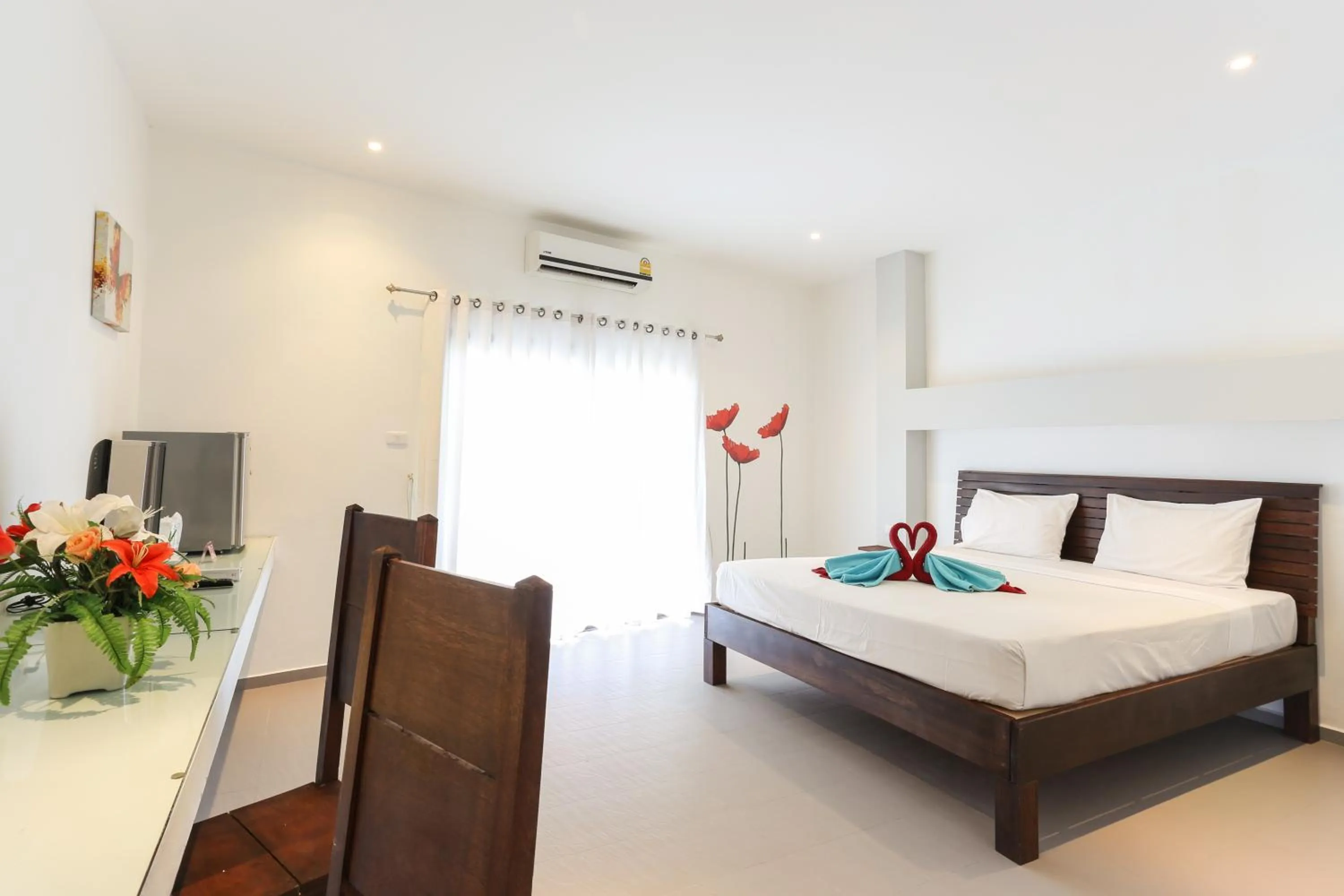 Photo of the whole room, Bed in Austrian Garden Hotel & Restaurant Patong