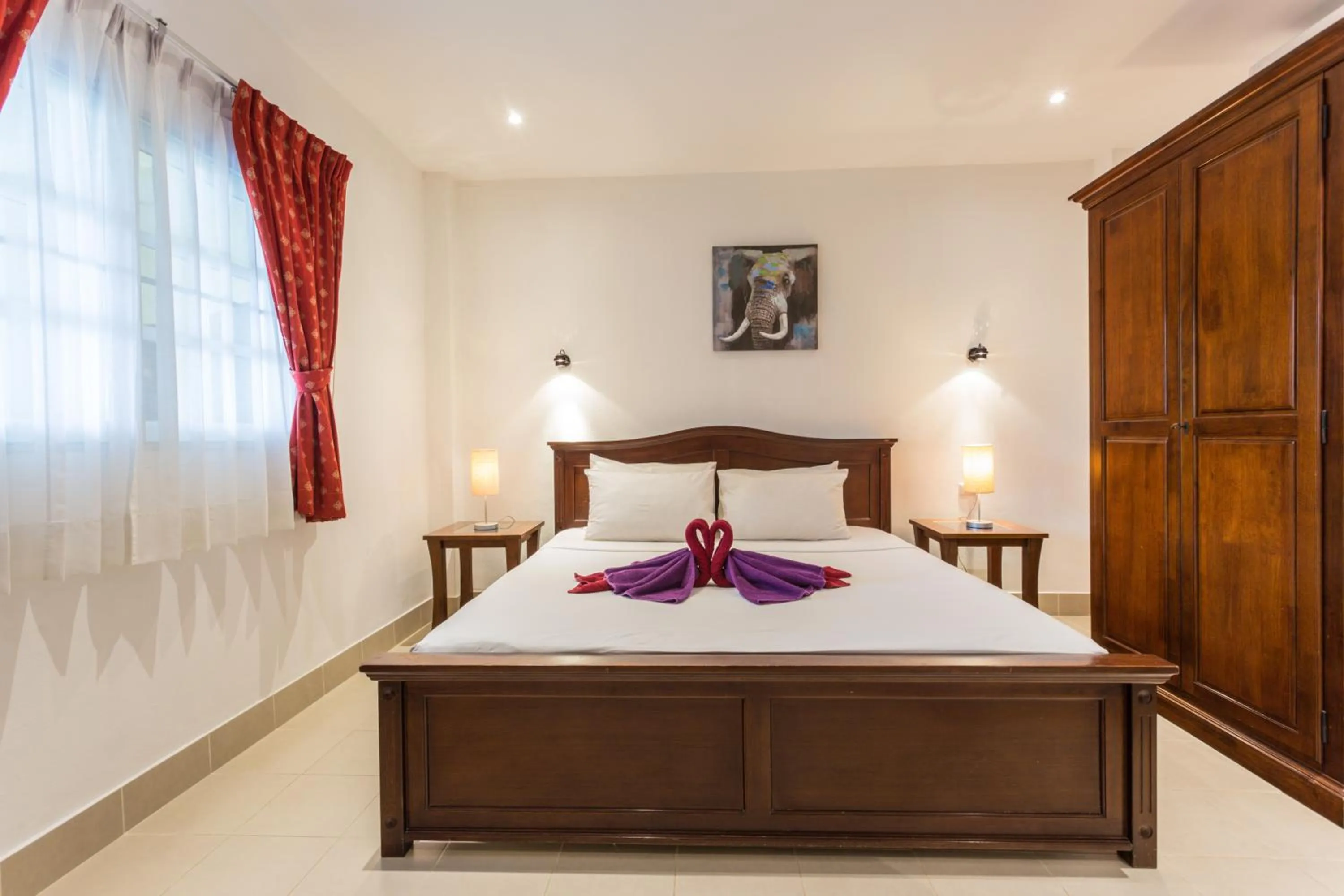 Photo of the whole room, Bed in Austrian Garden Hotel & Restaurant Patong