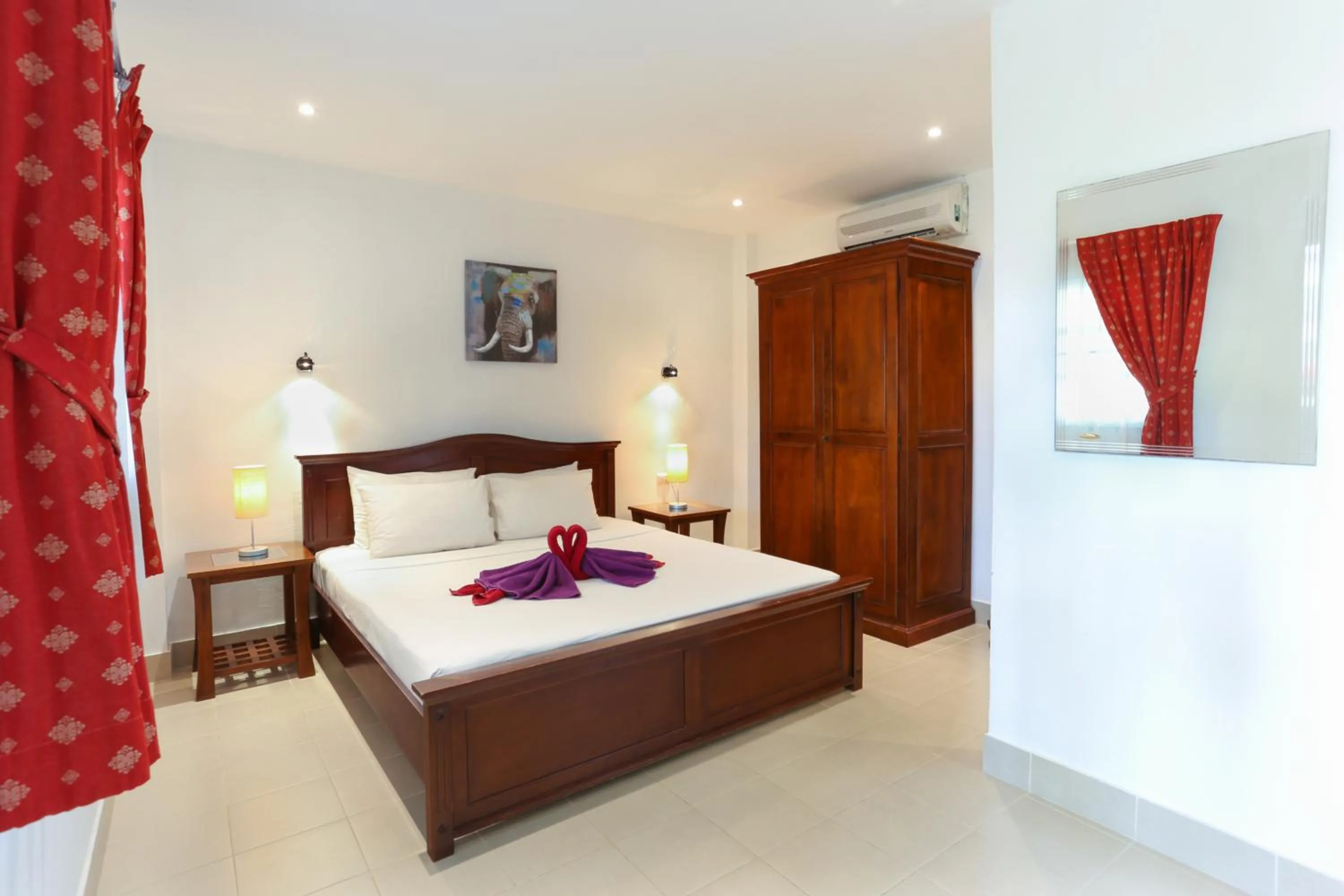 Photo of the whole room, Bed in Austrian Garden Hotel & Restaurant Patong