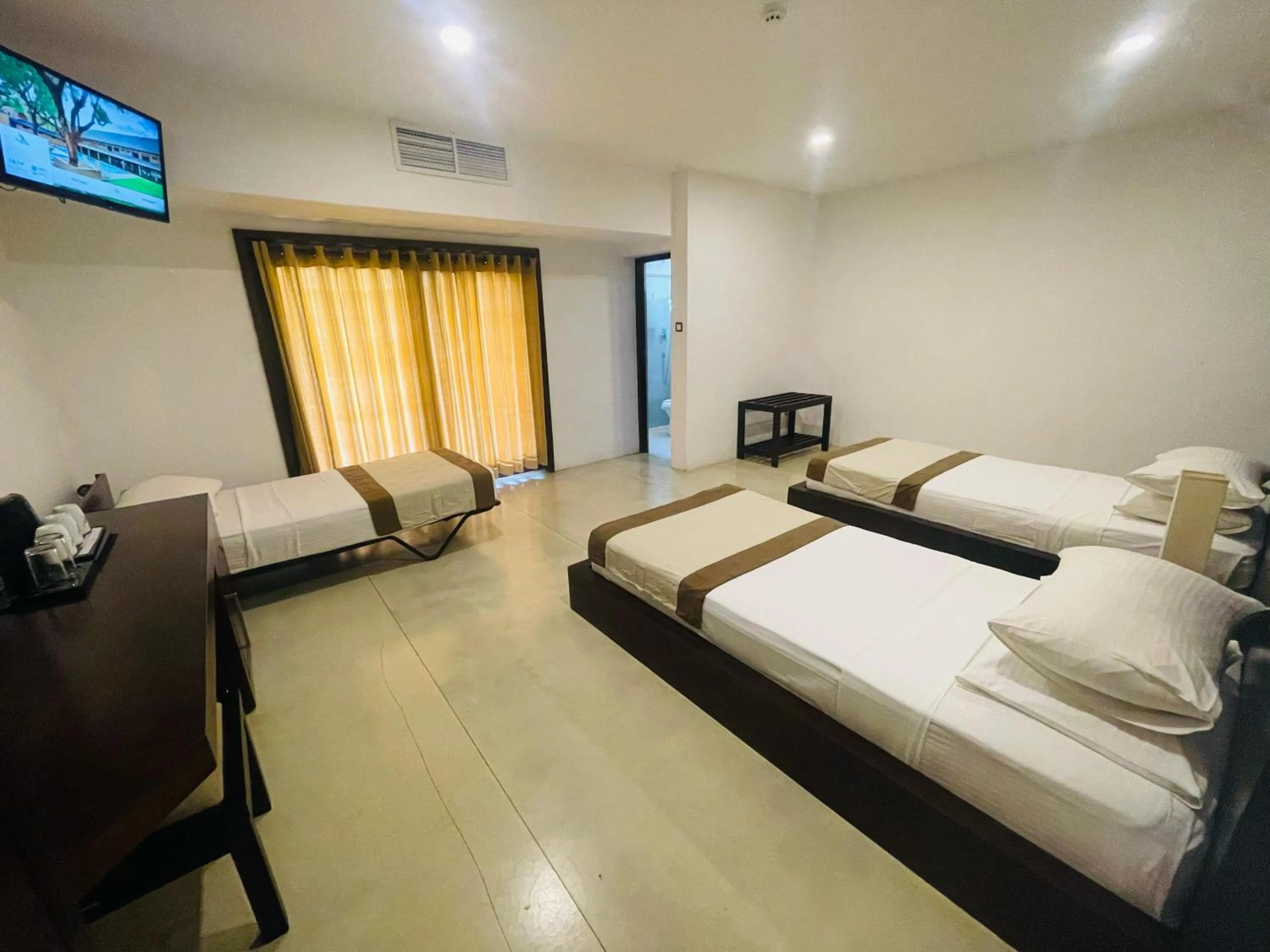 Photo of the whole room, Bed in Rajarata Hotel Anuradhapura