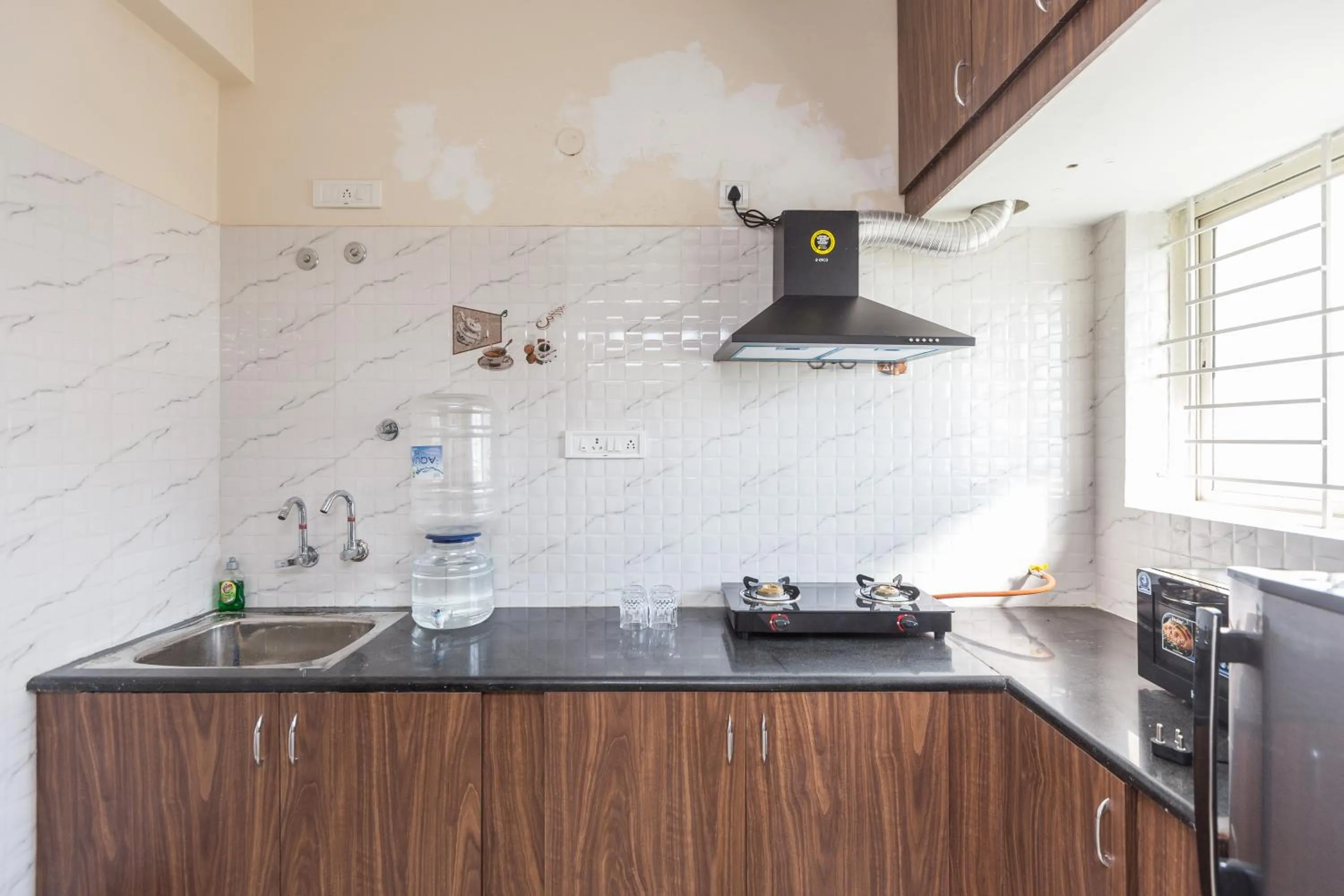 Kitchen or kitchenette in Misty Meridian Serviced Apartments