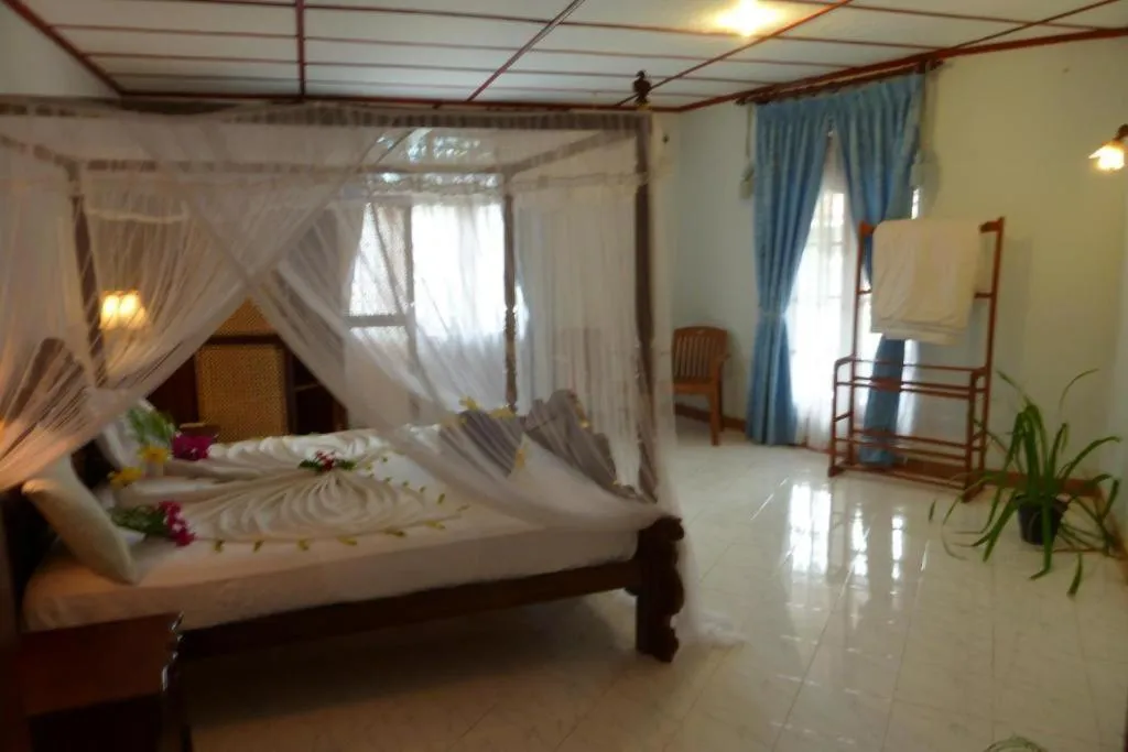 Bed in Bougain Villa