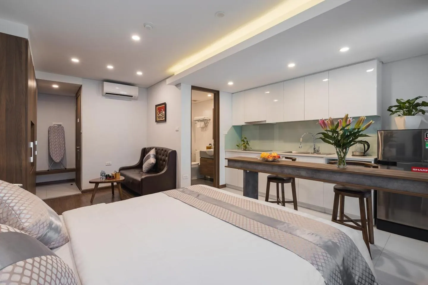 Bed in Narcissus Hotel & Apartment