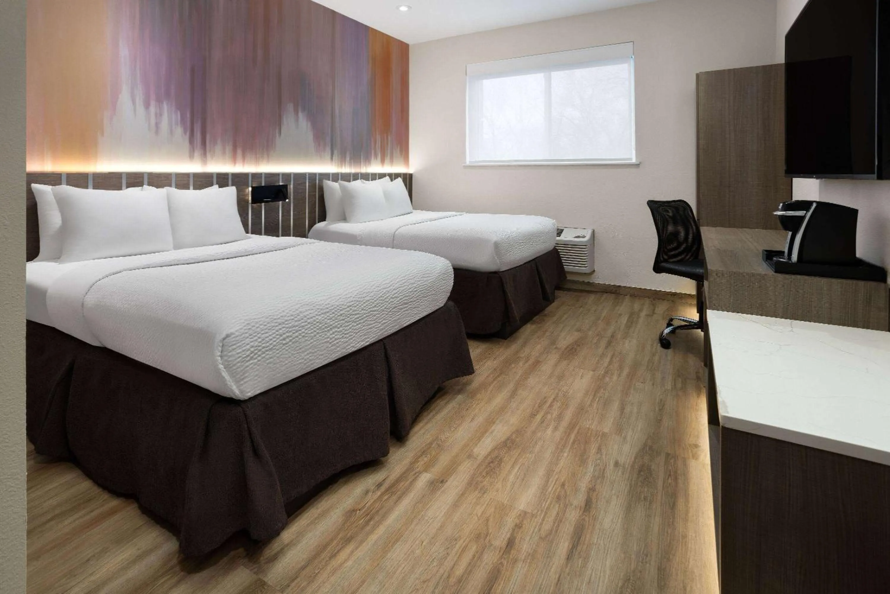 Photo of the whole room, Bed in Ramada by Wyndham Bronx