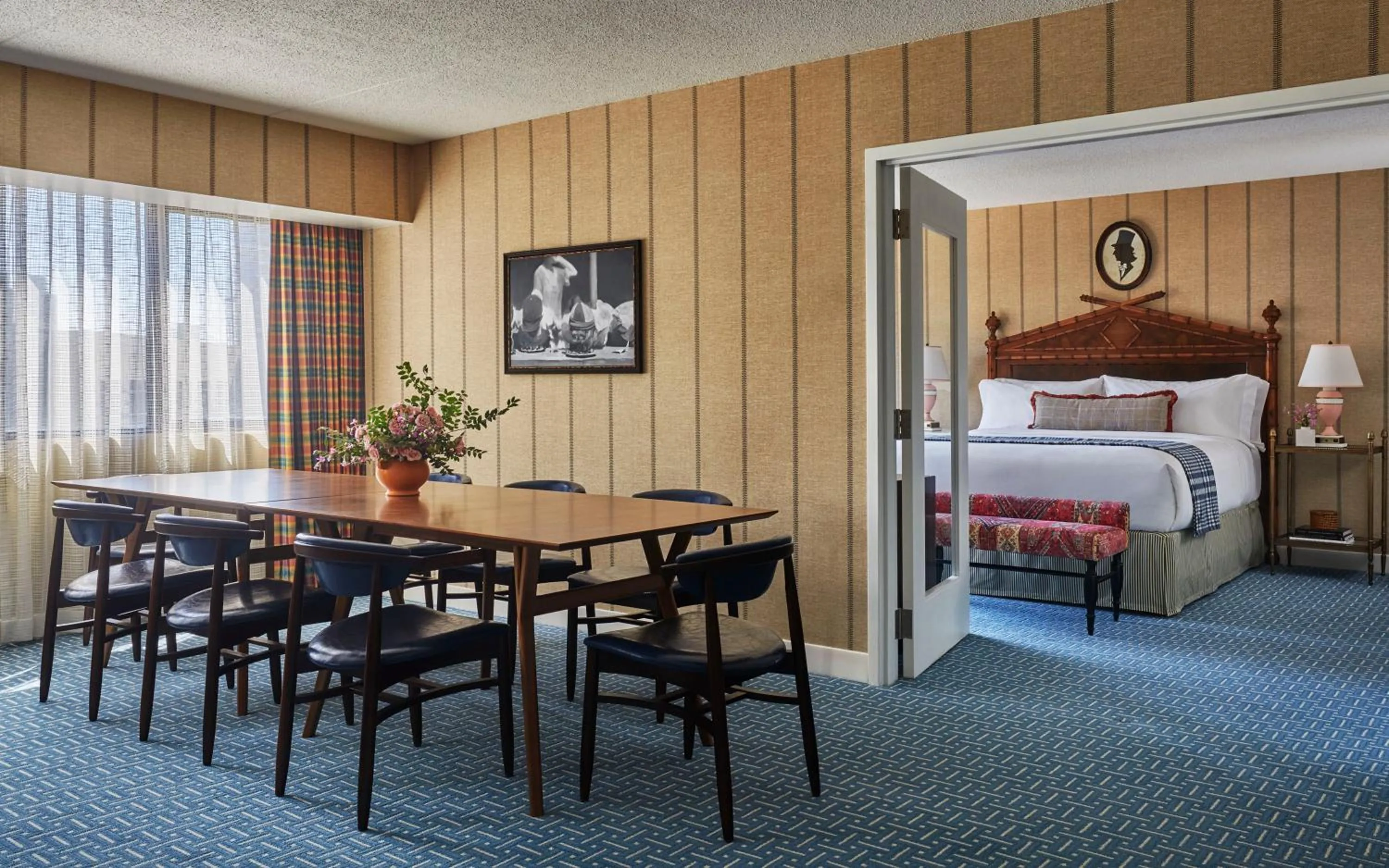 Dining area, Bed in Graduate by Hilton Iowa City