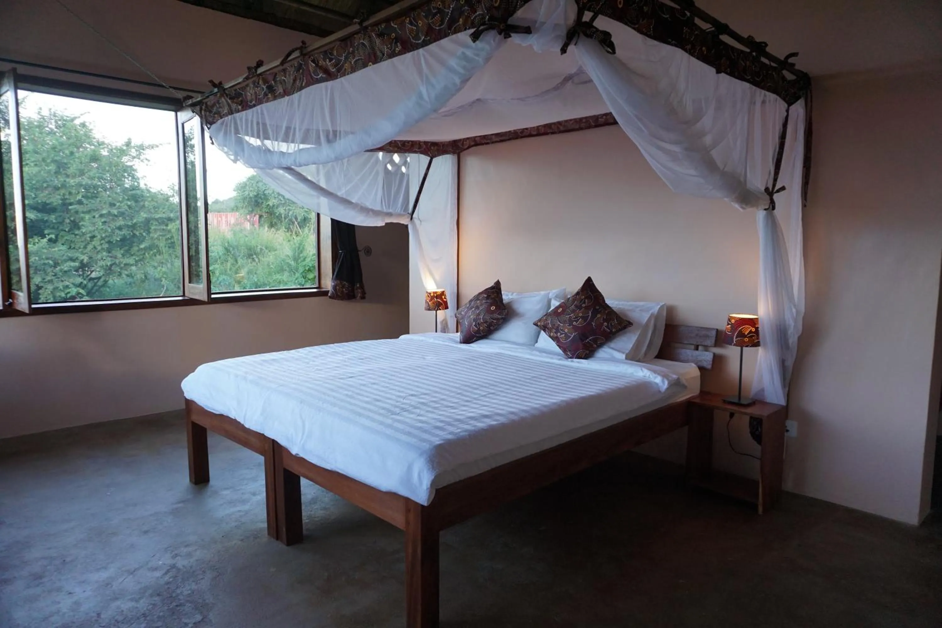 Bed in Kikonko Lodge