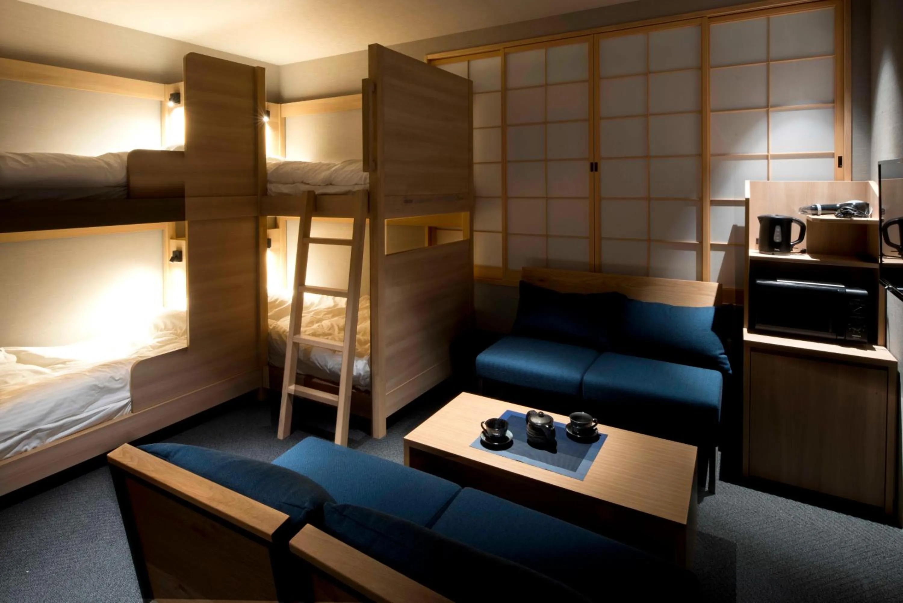 Bed in ALPHABED INN Takamatsuekimae