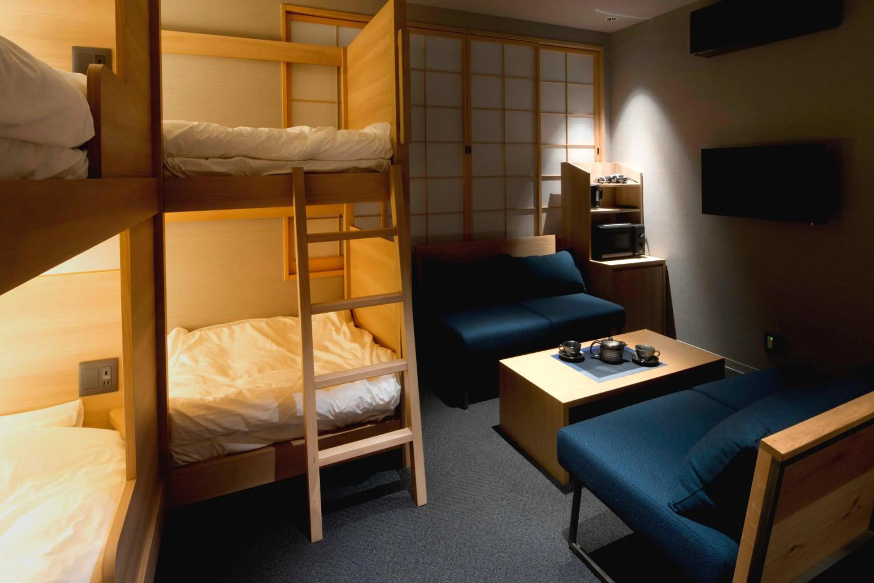 Bed in ALPHABED INN Takamatsuekimae