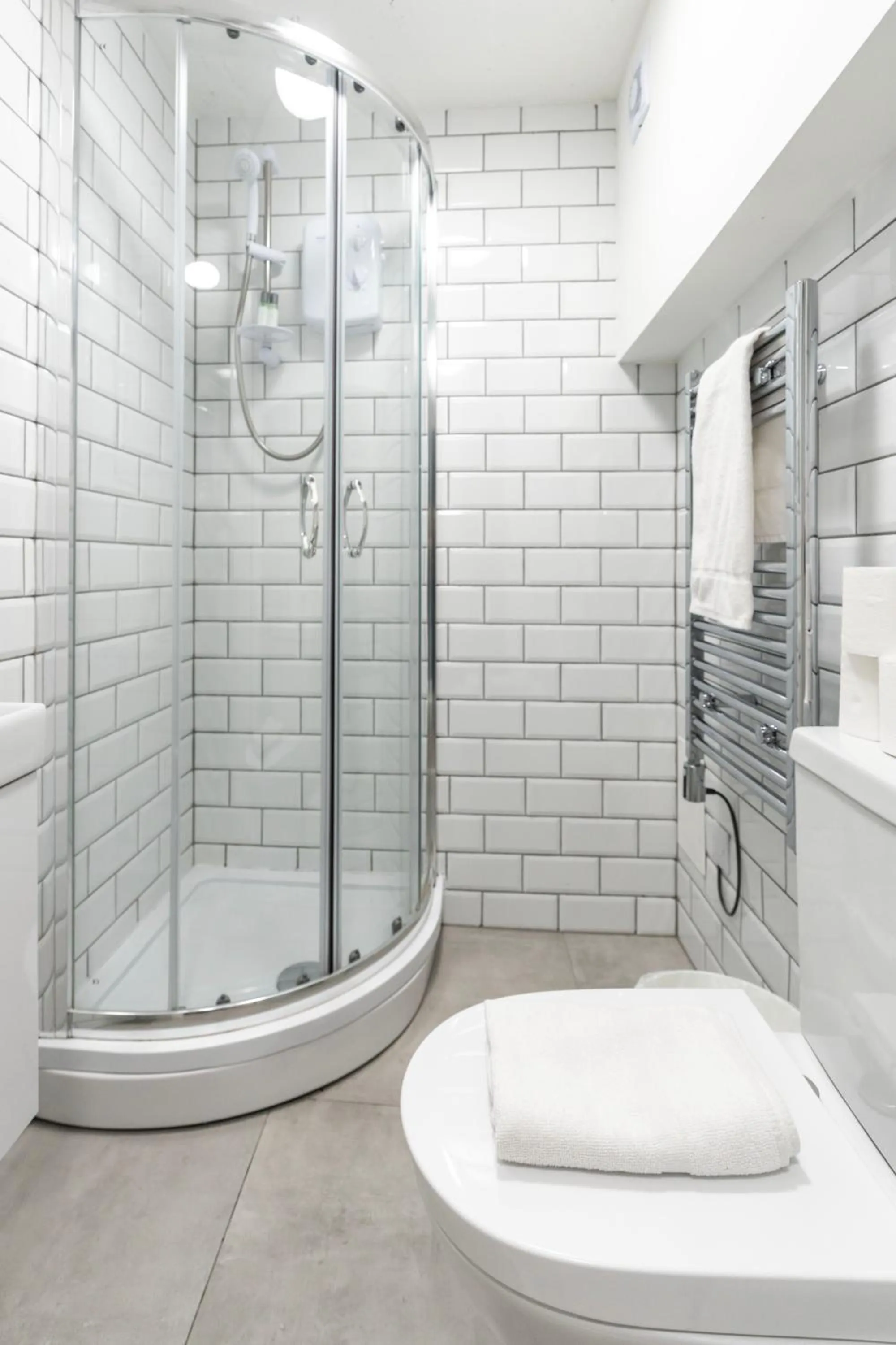 Shower in Shoreditch Apartments by PrimeCityHosts
