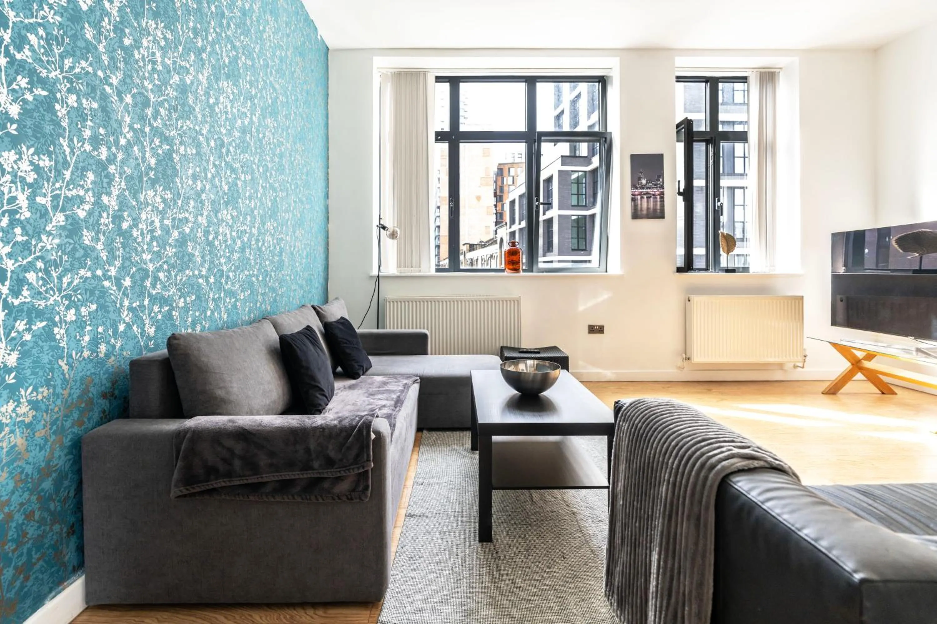 Living room in Shoreditch Apartments by PrimeCityHosts