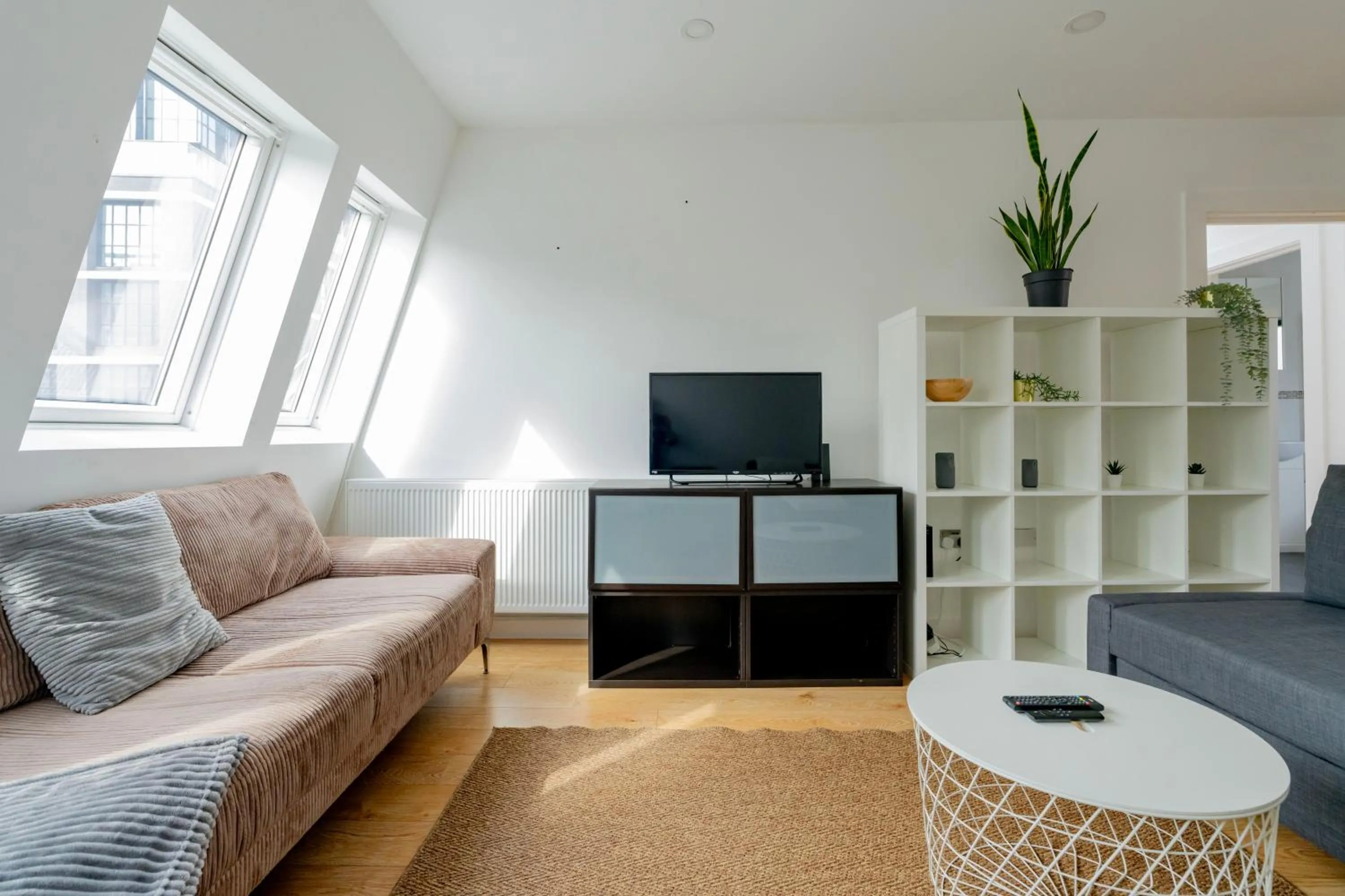 Living room in Shoreditch Apartments by PrimeCityHosts