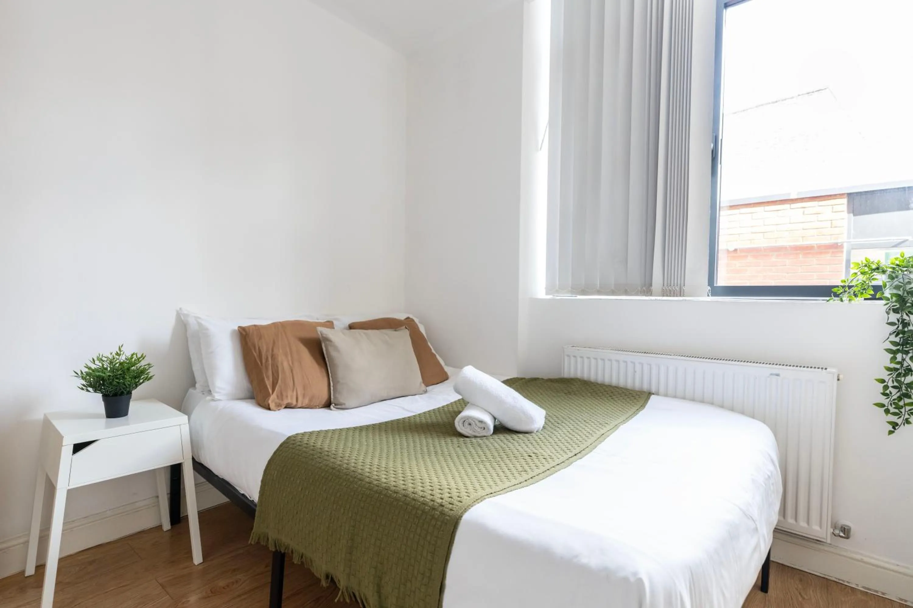 Bed in Shoreditch Apartments by PrimeCityHosts