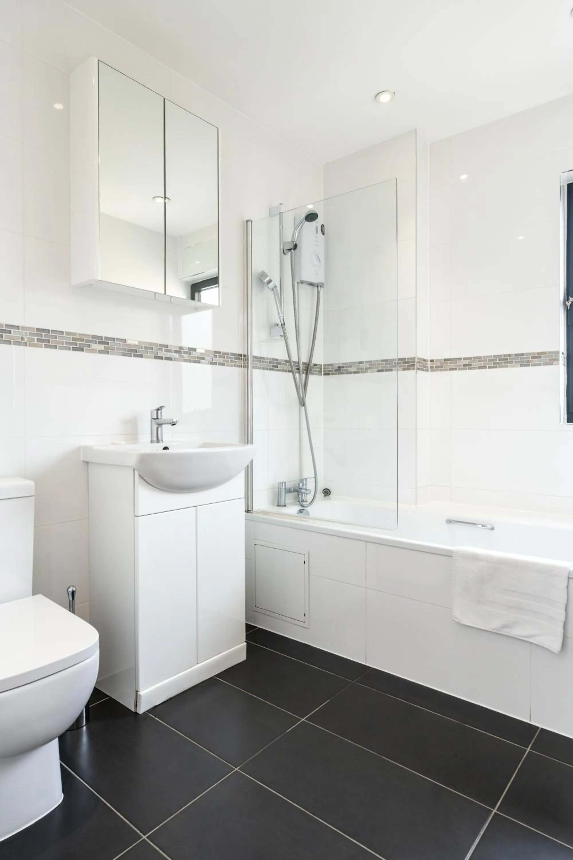 Bathroom in Shoreditch Apartments by PrimeCityHosts